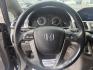 2014 Black /Gray Honda Odyssey EX-L (5FNRL5H6XEB) with an 3.5L V6 SOHC 24V engine, 6-Speed Automatic transmission, located at 547 E. Main St., Orwell, OH, 44076, (440) 437-5893, 41.535435, -80.847855 - This 2014 Honda Odyssey EX-L with Navigation is a well-equipped minivan featuring a 3.5L V6 engine and a 6-speed automatic transmission, delivering up to 27 MPG on the highway. It offers a comfortable ride with leather, heated, and power front seats, tri-zone automatic climate control, and a power m - Photo#24
