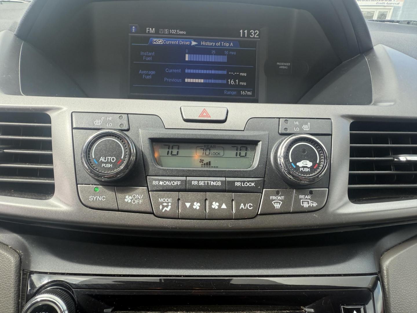 2014 Black /Gray Honda Odyssey EX-L (5FNRL5H6XEB) with an 3.5L V6 SOHC 24V engine, 6-Speed Automatic transmission, located at 547 E. Main St., Orwell, OH, 44076, (440) 437-5893, 41.535435, -80.847855 - This 2014 Honda Odyssey EX-L with Navigation is a well-equipped minivan featuring a 3.5L V6 engine and a 6-speed automatic transmission, delivering up to 27 MPG on the highway. It offers a comfortable ride with leather, heated, and power front seats, tri-zone automatic climate control, and a power m - Photo#28