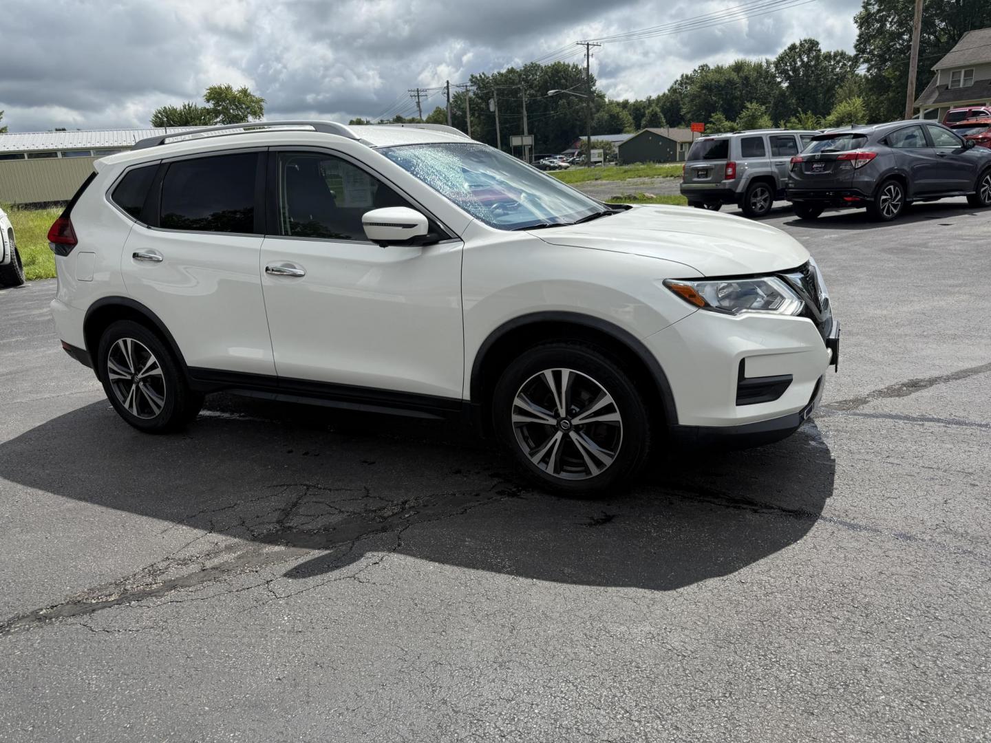 2019 White /Black Nissan Rogue SL AWD (JN8AT2MV6KW) with an 2.5L I4 DOHC 16V engine, Automatic transmission, located at 547 E. Main St., Orwell, OH, 44076, (440) 437-5893, 41.535435, -80.847855 - This 2019 Nissan Rogue SV AWD offers a fuel-efficient 2.5L I4 engine with an impressive 32 MPG highway rating and features a suite of advanced safety technologies, including Forward Collision Warning, Adaptive Cruise Control, Lane Keep Assist, Blind Spot Monitoring, and a 360-degree camera. Comfort - Photo#3