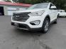 2016 White /Gray Hyundai Santa Fe SE AWD (KM8SMDHF7GU) with an 3.3L V6 DOHC 24V engine, 6A transmission, located at 547 E. Main St., Orwell, OH, 44076, (440) 437-5893, 41.535435, -80.847855 - Photo#0