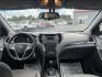 2016 White /Gray Hyundai Santa Fe SE AWD (KM8SMDHF7GU) with an 3.3L V6 DOHC 24V engine, 6A transmission, located at 547 E. Main St., Orwell, OH, 44076, (440) 437-5893, 41.535435, -80.847855 - Photo#37