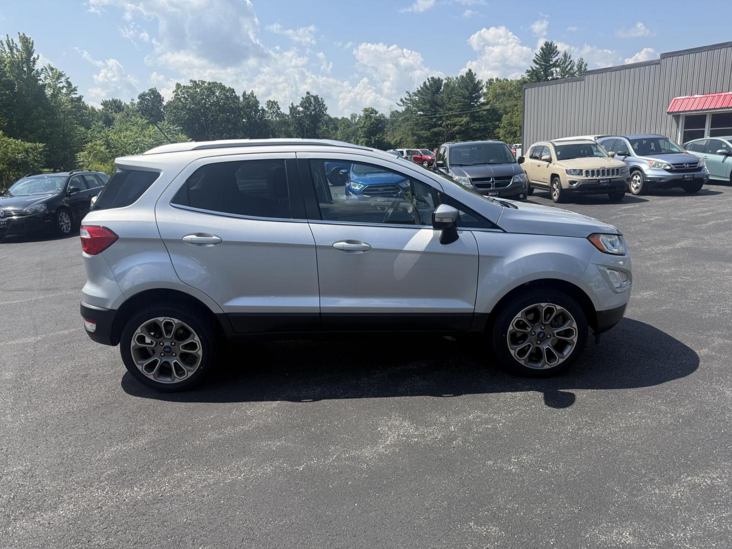 2018 Silver /Gray Ford EcoSport Titanium AWD (MAJ6P1WL0JC) with an 2.0L I4 DOHC 16V engine, 6-Speed Automatic transmission, located at 11115 Chardon Rd. , Chardon, OH, 44024, (440) 214-9705, 41.580246, -81.241943 - This 2018 Ford EcoSport Titanium 4WD features a 2.0L I4 engine paired with a 6-speed automatic transmission, delivering up to 29 MPG on the highway. It boasts a leather interior with heated front seats, a single-zone automatic climate control system, and a premium B&O sound system. Technological ame - Photo#5