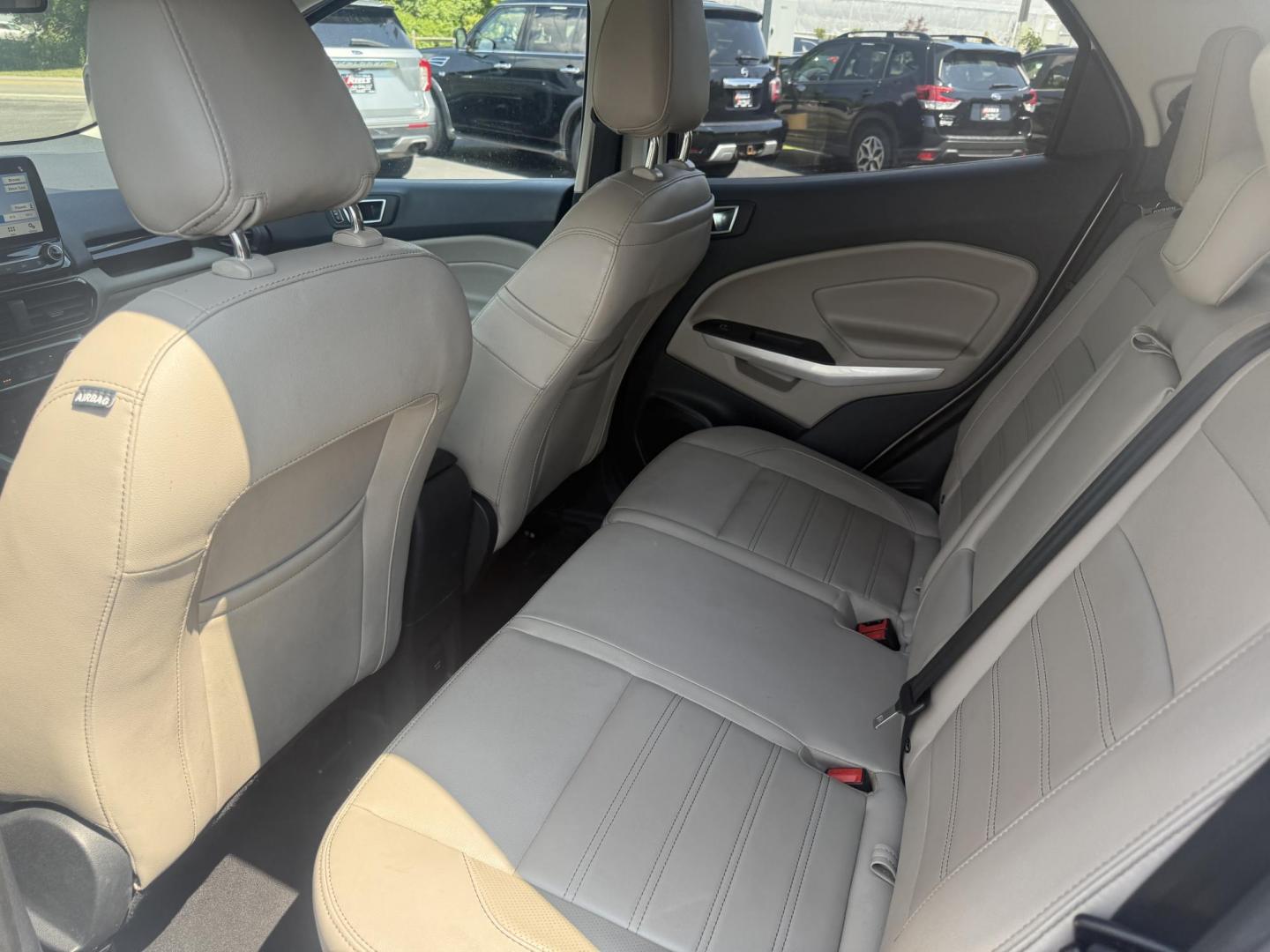 2018 Silver /Gray Ford EcoSport Titanium AWD (MAJ6P1WL0JC) with an 2.0L I4 DOHC 16V engine, 6-Speed Automatic transmission, located at 11115 Chardon Rd. , Chardon, OH, 44024, (440) 214-9705, 41.580246, -81.241943 - This 2018 Ford EcoSport Titanium 4WD features a 2.0L I4 engine paired with a 6-speed automatic transmission, delivering up to 29 MPG on the highway. It boasts a leather interior with heated front seats, a single-zone automatic climate control system, and a premium B&O sound system. Technological ame - Photo#36