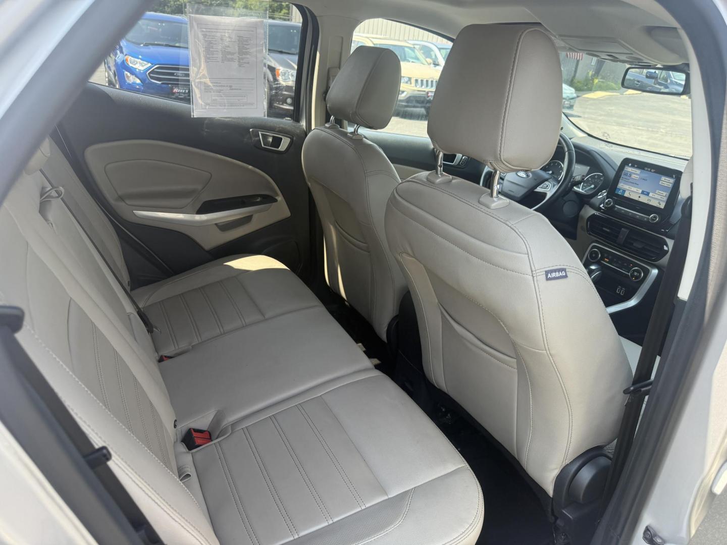 2018 Silver /Gray Ford EcoSport Titanium AWD (MAJ6P1WL0JC) with an 2.0L I4 DOHC 16V engine, 6-Speed Automatic transmission, located at 11115 Chardon Rd. , Chardon, OH, 44024, (440) 214-9705, 41.580246, -81.241943 - This 2018 Ford EcoSport Titanium 4WD features a 2.0L I4 engine paired with a 6-speed automatic transmission, delivering up to 29 MPG on the highway. It boasts a leather interior with heated front seats, a single-zone automatic climate control system, and a premium B&O sound system. Technological ame - Photo#42