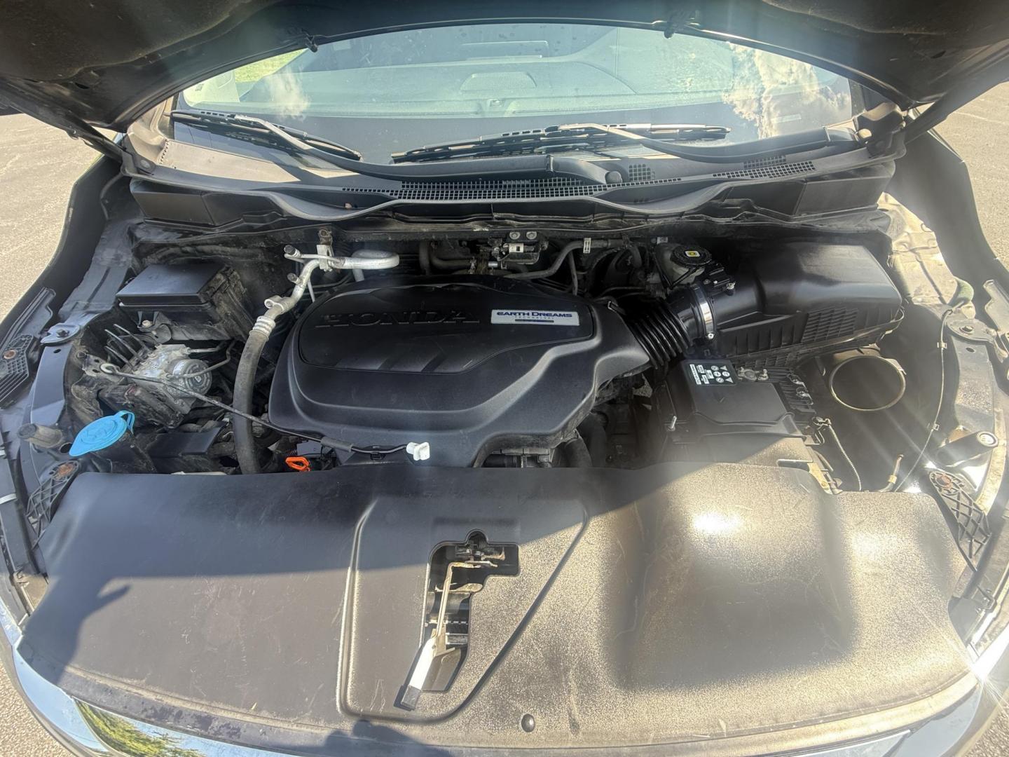 2018 Black /Gray Honda Odyssey EX (5FNRL6H53JB) with an 3.5L V6 SOHC 24V engine, 9 Speed Automatic transmission, located at 11115 Chardon Rd. , Chardon, OH, 44024, (440) 214-9705, 41.580246, -81.241943 - This 2018 Honda Odyssey EX is a family-friendly minivan powered by a 3.5L V6 engine paired with a 9-speed automatic transmission, achieving approximately 28 MPG on the highway. It features an 8.0" touchscreen infotainment system, a 7.0" gauge cluster screen, and supports Apple CarPlay and Android Au - Photo#13