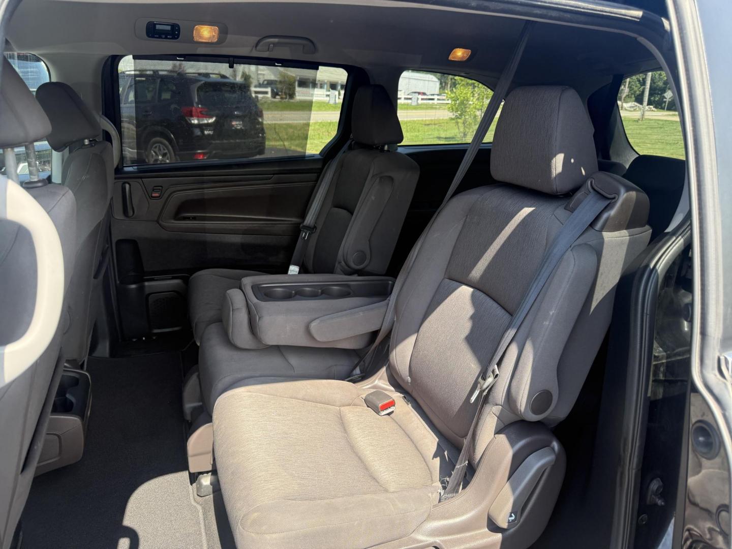 2018 Black /Gray Honda Odyssey EX (5FNRL6H53JB) with an 3.5L V6 SOHC 24V engine, 9 Speed Automatic transmission, located at 11115 Chardon Rd. , Chardon, OH, 44024, (440) 214-9705, 41.580246, -81.241943 - This 2018 Honda Odyssey EX is a family-friendly minivan powered by a 3.5L V6 engine paired with a 9-speed automatic transmission, achieving approximately 28 MPG on the highway. It features an 8.0" touchscreen infotainment system, a 7.0" gauge cluster screen, and supports Apple CarPlay and Android Au - Photo#29