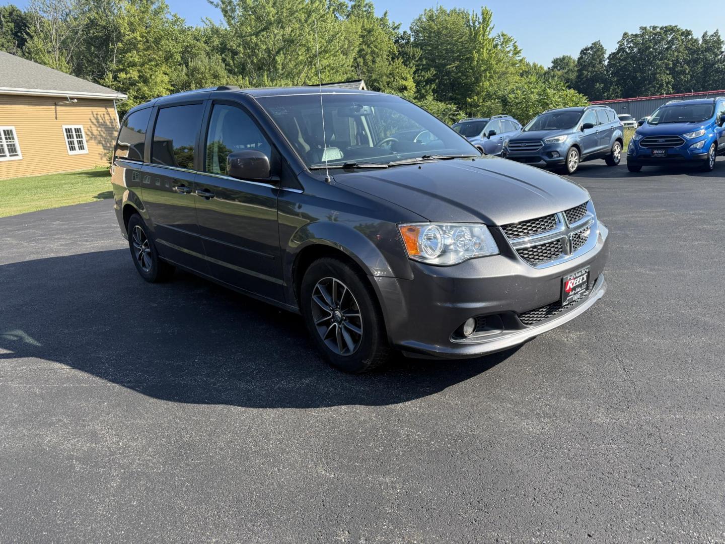 2017 Gray /Black Dodge Grand Caravan SE (2C4RDGBG0HR) with an 3.6L V6 DOHC 24V FFV engine, 6A transmission, located at 11115 Chardon Rd. , Chardon, OH, 44024, (440) 214-9705, 41.580246, -81.241943 - This 2017 Dodge Grand Caravan SE is a versatile minivan powered by a 3.6L Pentastar V6 engine with a 6-speed automatic transmission, offering practical features like daytime running lights, flex-fuel capability, and a power driver's seat. It provides comfortable seating with 2nd-row captain’s chai - Photo#2
