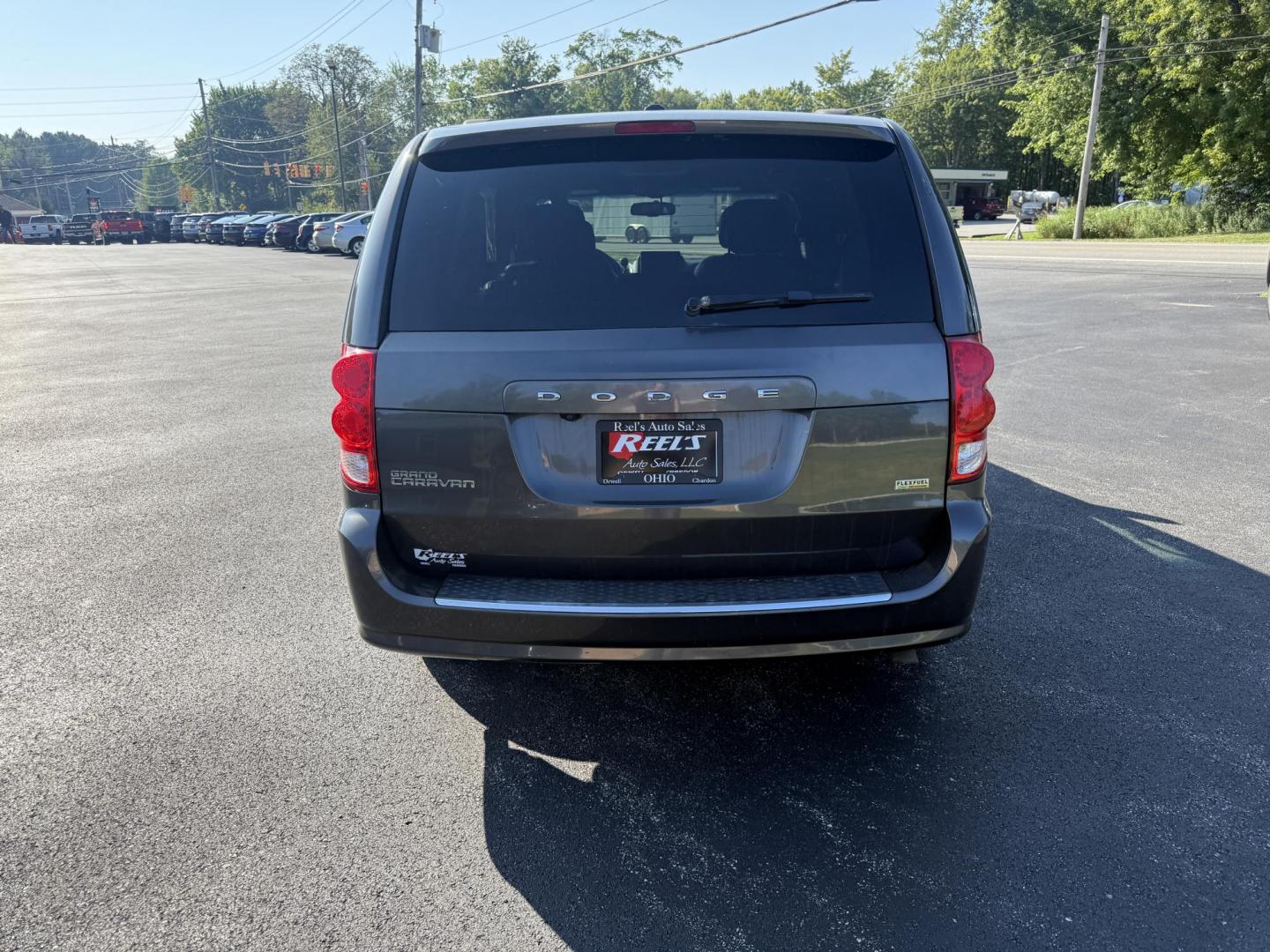 2017 Gray /Black Dodge Grand Caravan SE (2C4RDGBG0HR) with an 3.6L V6 DOHC 24V FFV engine, 6A transmission, located at 11115 Chardon Rd. , Chardon, OH, 44024, (440) 214-9705, 41.580246, -81.241943 - This 2017 Dodge Grand Caravan SE is a versatile minivan powered by a 3.6L Pentastar V6 engine with a 6-speed automatic transmission, offering practical features like daytime running lights, flex-fuel capability, and a power driver's seat. It provides comfortable seating with 2nd-row captain’s chai - Photo#8