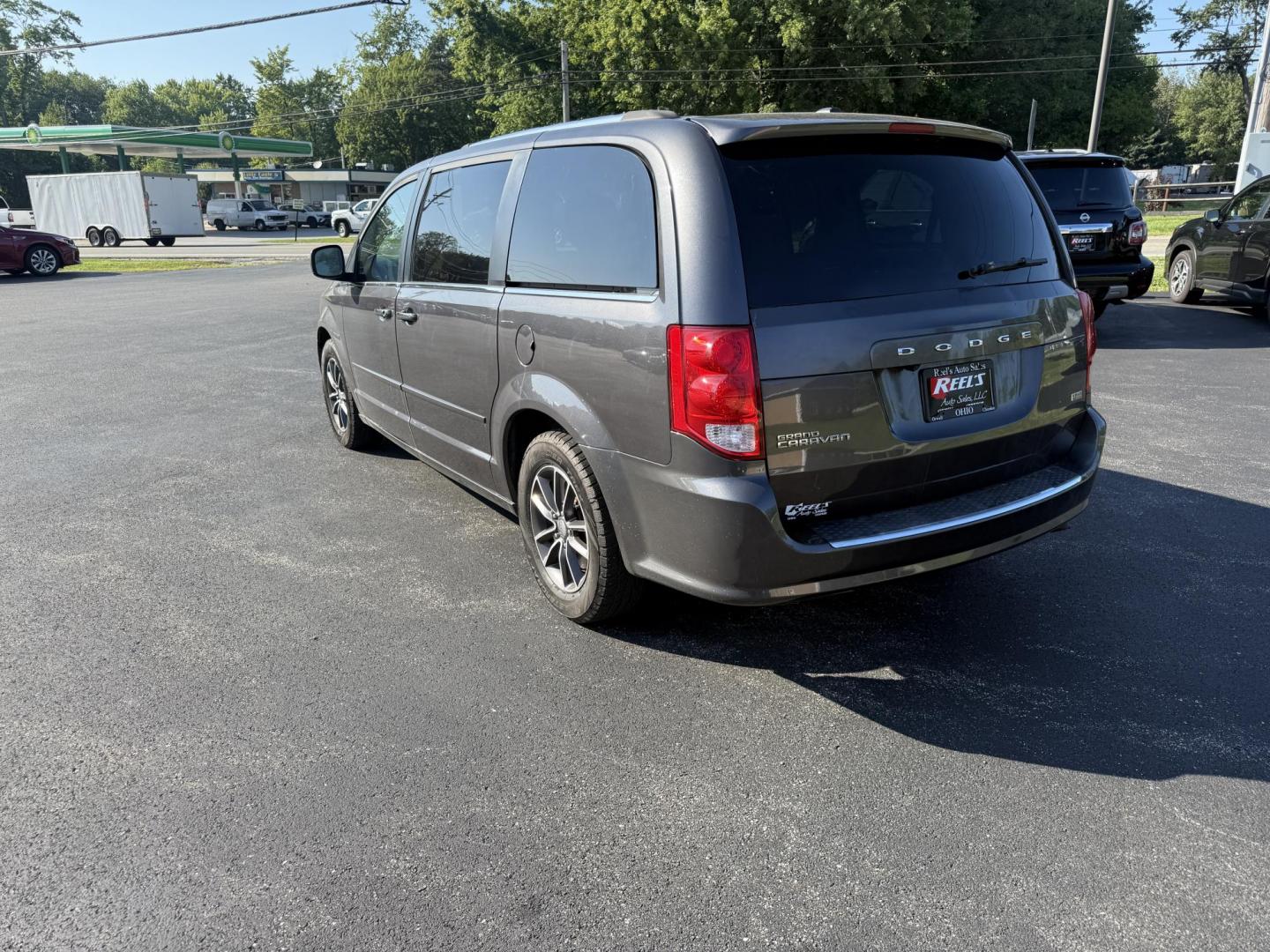 2017 Gray /Black Dodge Grand Caravan SE (2C4RDGBG0HR) with an 3.6L V6 DOHC 24V FFV engine, 6A transmission, located at 11115 Chardon Rd. , Chardon, OH, 44024, (440) 214-9705, 41.580246, -81.241943 - This 2017 Dodge Grand Caravan SE is a versatile minivan powered by a 3.6L Pentastar V6 engine with a 6-speed automatic transmission, offering practical features like daytime running lights, flex-fuel capability, and a power driver's seat. It provides comfortable seating with 2nd-row captain’s chai - Photo#9