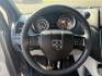 2017 Gray /Black Dodge Grand Caravan SE (2C4RDGBG0HR) with an 3.6L V6 DOHC 24V FFV engine, 6A transmission, located at 11115 Chardon Rd. , Chardon, OH, 44024, (440) 214-9705, 41.580246, -81.241943 - This 2017 Dodge Grand Caravan SE is a versatile minivan powered by a 3.6L Pentastar V6 engine with a 6-speed automatic transmission, offering practical features like daytime running lights, flex-fuel capability, and a power driver's seat. It provides comfortable seating with 2nd-row captain’s chai - Photo#24