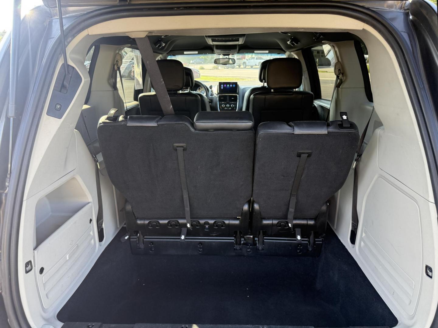 2017 Gray /Black Dodge Grand Caravan SE (2C4RDGBG0HR) with an 3.6L V6 DOHC 24V FFV engine, 6A transmission, located at 11115 Chardon Rd. , Chardon, OH, 44024, (440) 214-9705, 41.580246, -81.241943 - This 2017 Dodge Grand Caravan SE is a versatile minivan powered by a 3.6L Pentastar V6 engine with a 6-speed automatic transmission, offering practical features like daytime running lights, flex-fuel capability, and a power driver's seat. It provides comfortable seating with 2nd-row captain’s chai - Photo#39