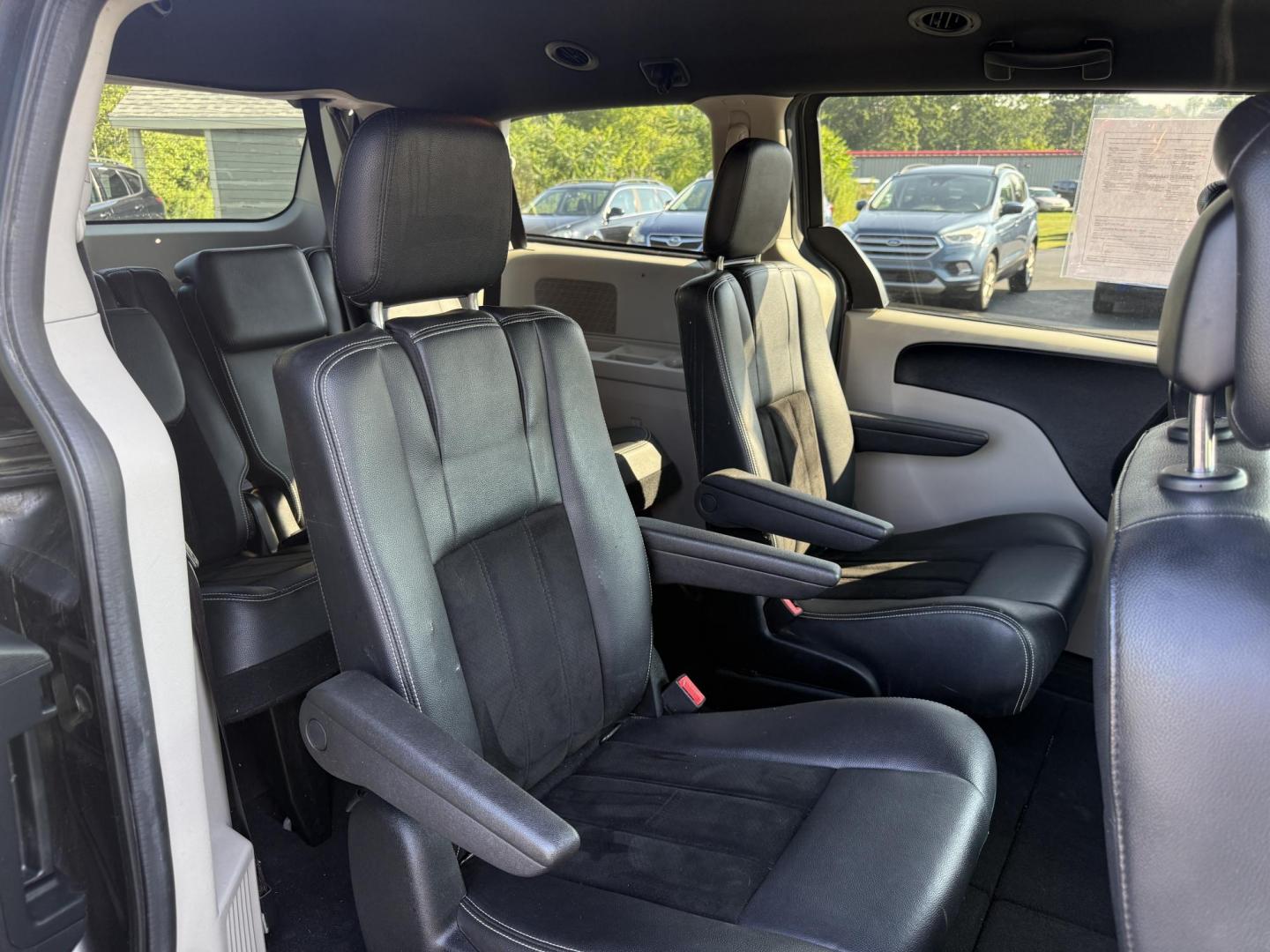 2017 Gray /Black Dodge Grand Caravan SE (2C4RDGBG0HR) with an 3.6L V6 DOHC 24V FFV engine, 6A transmission, located at 11115 Chardon Rd. , Chardon, OH, 44024, (440) 214-9705, 41.580246, -81.241943 - This 2017 Dodge Grand Caravan SE is a versatile minivan powered by a 3.6L Pentastar V6 engine with a 6-speed automatic transmission, offering practical features like daytime running lights, flex-fuel capability, and a power driver's seat. It provides comfortable seating with 2nd-row captain’s chai - Photo#41