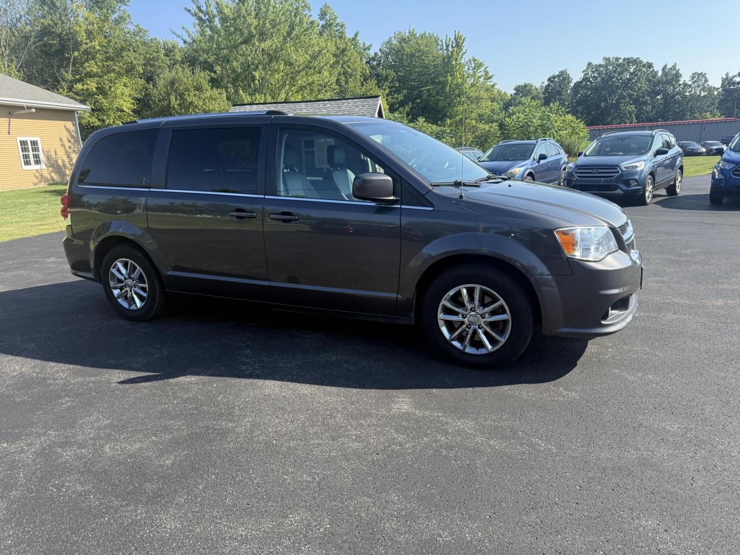 2019 Gray /Black Dodge Grand Caravan SXT (2C4RDGCGXKR) with an 3.6L V6 DOHC 24V FFV engine, 6A transmission, located at 11115 Chardon Rd. , Chardon, OH, 44024, (440) 214-9705, 41.580246, -81.241943 - This 2019 Dodge Grand Caravan SXT features a 3.6L Pentastar V6 engine paired with a 6-speed automatic transmission, offering flex-fuel capability for added versatility. It comes equipped with a 6.5" touchscreen infotainment system, Stow 'n Go seating for flexible cargo and passenger arrangements, an - Photo#3