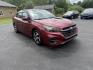 2023 Red /Black Subaru Legacy Premium (4S3BWAC6XP3) with an 2.5L H4 DOHC 16V engine, Automatic transmission, located at 11115 Chardon Rd. , Chardon, OH, 44024, (440) 214-9705, 41.580246, -81.241943 - This One Owner 2023 Subaru Legacy Premium, equipped with a 2.5L H4 engine and Symmetrical All-Wheel Drive, offers up to 35 MPG on the highway. It features full LED exterior lighting, a power driver's seat, Subaru's EyeSight Driver Assist suite (including adaptive cruise control, lane keep assist, an - Photo#2