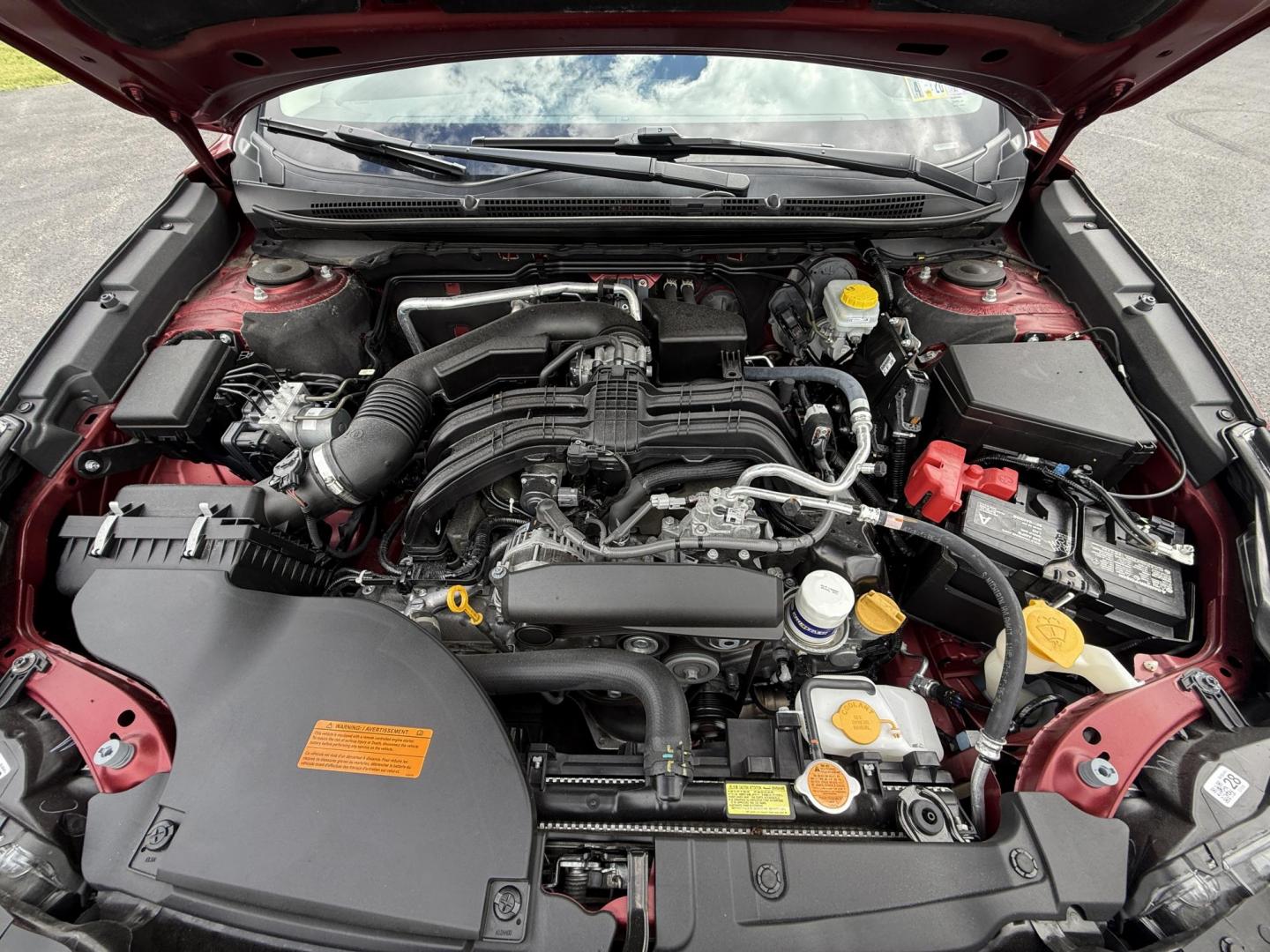 2023 Red /Black Subaru Legacy Premium (4S3BWAC6XP3) with an 2.5L H4 DOHC 16V engine, Automatic transmission, located at 11115 Chardon Rd. , Chardon, OH, 44024, (440) 214-9705, 41.580246, -81.241943 - This One Owner 2023 Subaru Legacy Premium, equipped with a 2.5L H4 engine and Symmetrical All-Wheel Drive, offers up to 35 MPG on the highway. It features full LED exterior lighting, a power driver's seat, Subaru's EyeSight Driver Assist suite (including adaptive cruise control, lane keep assist, an - Photo#14
