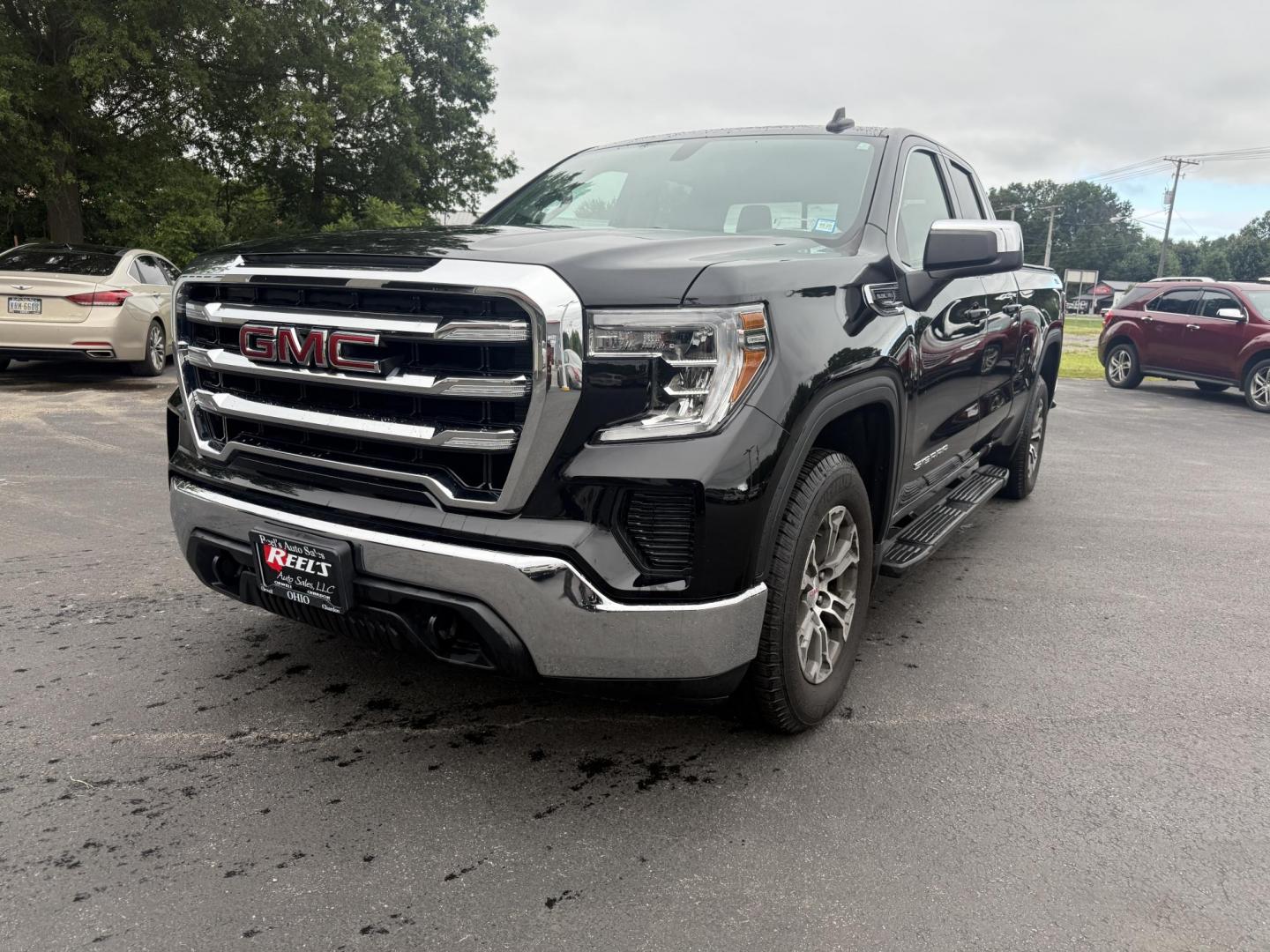 2019 Black /Black GMC Sierra 1500 SLE Double Cab 4WD (1GTR9BED1KZ) with an 5.3L V8 OHV 16V engine, 6A transmission, located at 547 E. Main St., Orwell, OH, 44076, (440) 437-5893, 41.535435, -80.847855 - This One Owner 2019 GMC Sierra 1500 SLE Double Cab, equipped with a powerful 5.3L EcoTec3 V8 engine and an 8-speed automatic transmission, features the X31 Offroad Package, G80 locking rear differential, and 3.23 gearing, giving it a robust 9,400-pound towing capacity. Comfort and technology highlig - Photo#0