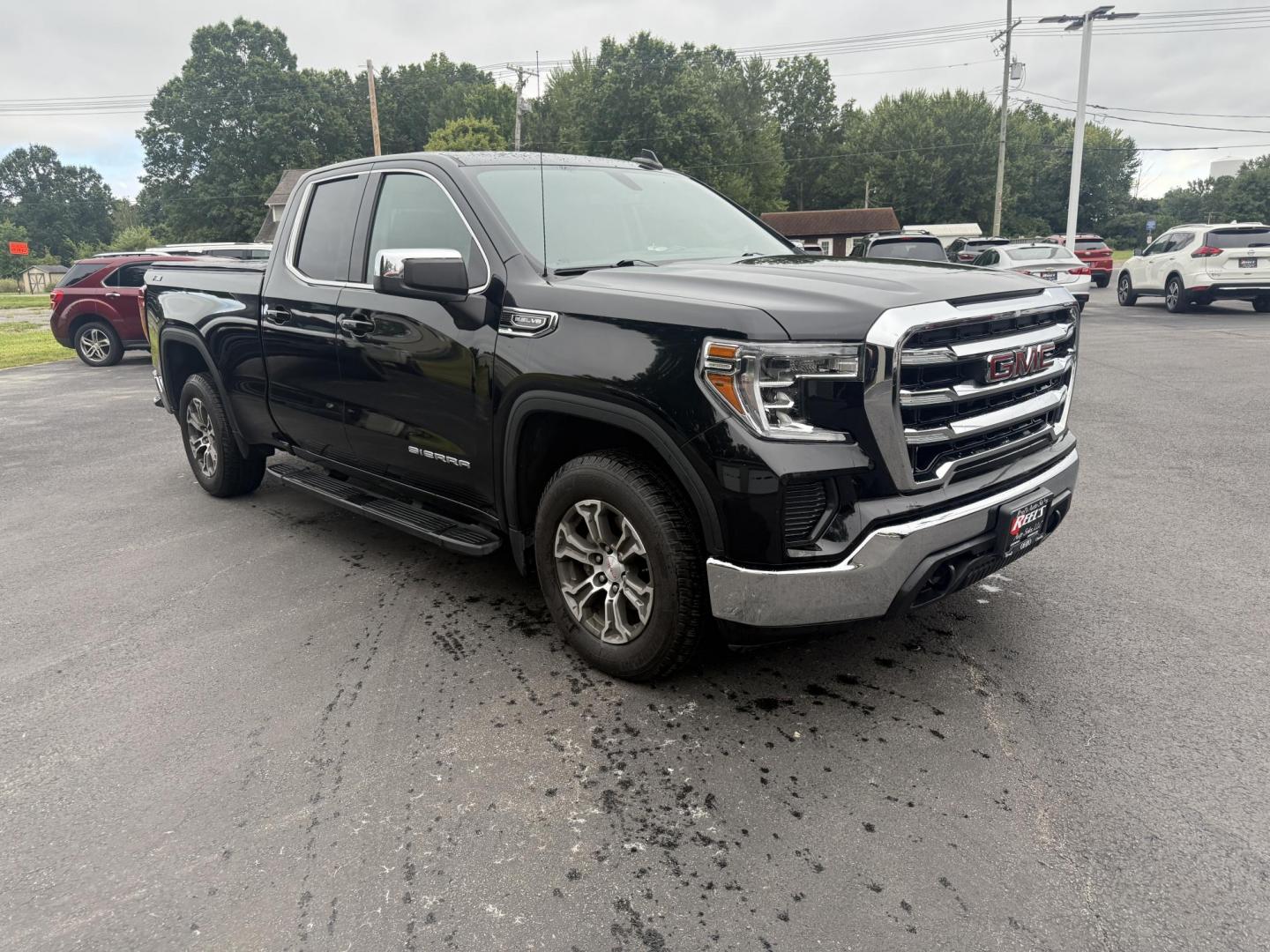 2019 Black /Black GMC Sierra 1500 SLE Double Cab 4WD (1GTR9BED1KZ) with an 5.3L V8 OHV 16V engine, 6A transmission, located at 547 E. Main St., Orwell, OH, 44076, (440) 437-5893, 41.535435, -80.847855 - This One Owner 2019 GMC Sierra 1500 SLE Double Cab, equipped with a powerful 5.3L EcoTec3 V8 engine and an 8-speed automatic transmission, features the X31 Offroad Package, G80 locking rear differential, and 3.23 gearing, giving it a robust 9,400-pound towing capacity. Comfort and technology highlig - Photo#2