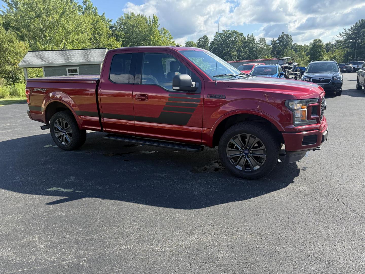 2018 Red /Black Ford F-150 XLT SuperCab 6.5-ft. 4WD (1FTEX1EP7JF) with an 2.7L V6 DOHC 24V TWIN TURBO engine, 10 Speed Auto transmission, located at 11115 Chardon Rd. , Chardon, OH, 44024, (440) 214-9705, 41.580246, -81.241943 - This 2018 Ford F-150 XLT SuperCab 4WD, powered by a 2.7L Twin Turbo EcoBoost V6 and paired with a 10-speed automatic transmission, offers robust performance and versatility, including a 3.73 locking rear differential and an 8,100-pound towing capacity. Comfort and convenience features include power - Photo#3