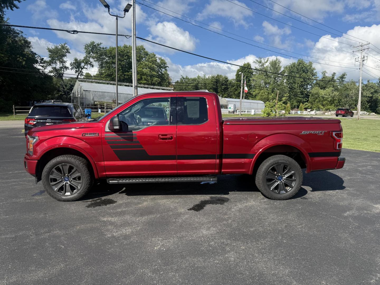 2018 Red /Black Ford F-150 XLT SuperCab 6.5-ft. 4WD (1FTEX1EP7JF) with an 2.7L V6 DOHC 24V TWIN TURBO engine, 10 Speed Auto transmission, located at 11115 Chardon Rd. , Chardon, OH, 44024, (440) 214-9705, 41.580246, -81.241943 - This 2018 Ford F-150 XLT SuperCab 4WD, powered by a 2.7L Twin Turbo EcoBoost V6 and paired with a 10-speed automatic transmission, offers robust performance and versatility, including a 3.73 locking rear differential and an 8,100-pound towing capacity. Comfort and convenience features include power - Photo#14