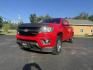 2015 Red /Black Chevrolet Colorado Z71 Crew Cab 4WD Long Box (1GCGTCE34F1) with an 3.6L V6 DOHC 24V GAS engine, 6-Speed Automatic transmission, located at 11115 Chardon Rd. , Chardon, OH, 44024, (440) 214-9705, 41.580246, -81.241943 - This 2015 Chevrolet Colorado Z71 Crew Cab 4WD, equipped with a 3.6L V6 engine and a 6-speed automatic transmission, delivers a balanced mix of power and efficiency with up to 24 MPG highway and a 7,000-pound towing capacity thanks to its 3.42 gearing and G80 locking rear differential. This midsize t - Photo#0