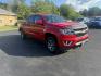2015 Red /Black Chevrolet Colorado Z71 Crew Cab 4WD Long Box (1GCGTCE34F1) with an 3.6L V6 DOHC 24V GAS engine, 6-Speed Automatic transmission, located at 11115 Chardon Rd. , Chardon, OH, 44024, (440) 214-9705, 41.580246, -81.241943 - This 2015 Chevrolet Colorado Z71 Crew Cab 4WD, equipped with a 3.6L V6 engine and a 6-speed automatic transmission, delivers a balanced mix of power and efficiency with up to 24 MPG highway and a 7,000-pound towing capacity thanks to its 3.42 gearing and G80 locking rear differential. This midsize t - Photo#2