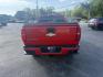 2015 Red /Black Chevrolet Colorado Z71 Crew Cab 4WD Long Box (1GCGTCE34F1) with an 3.6L V6 DOHC 24V GAS engine, 6-Speed Automatic transmission, located at 11115 Chardon Rd. , Chardon, OH, 44024, (440) 214-9705, 41.580246, -81.241943 - This 2015 Chevrolet Colorado Z71 Crew Cab 4WD, equipped with a 3.6L V6 engine and a 6-speed automatic transmission, delivers a balanced mix of power and efficiency with up to 24 MPG highway and a 7,000-pound towing capacity thanks to its 3.42 gearing and G80 locking rear differential. This midsize t - Photo#8