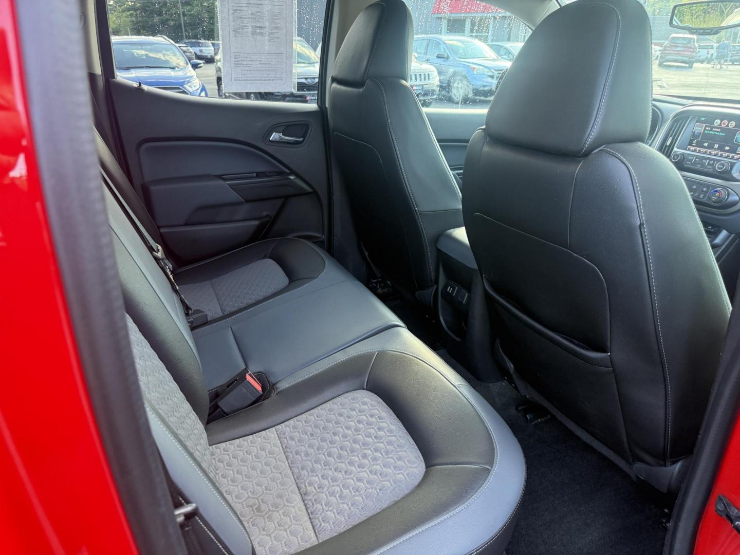 2015 Red /Black Chevrolet Colorado Z71 Crew Cab 4WD Long Box (1GCGTCE34F1) with an 3.6L V6 DOHC 24V GAS engine, 6-Speed Automatic transmission, located at 11115 Chardon Rd. , Chardon, OH, 44024, (440) 214-9705, 41.580246, -81.241943 - This 2015 Chevrolet Colorado Z71 Crew Cab 4WD, equipped with a 3.6L V6 engine and a 6-speed automatic transmission, delivers a balanced mix of power and efficiency with up to 24 MPG highway and a 7,000-pound towing capacity thanks to its 3.42 gearing and G80 locking rear differential. This midsize t - Photo#35