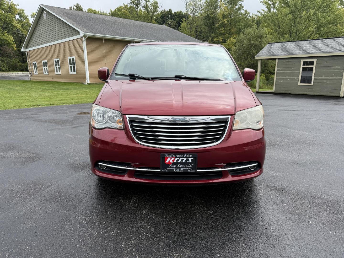 2015 Red /Tan Chrysler Town & Country Touring (2C4RC1BG5FR) with an 3.6L V6 DOHC 24V engine, 6-Speed Automatic transmission, located at 547 E. Main St., Orwell, OH, 44076, (440) 437-5893, 41.535435, -80.847855 - This 2015 Chrysler Town & Country Touring came from Maryland and it shows underneath, equipped with a 3.6L Pentastar V6 engine and 6-speed automatic transmission, offers a luxurious and versatile minivan experience with features like leather interior, tri-zone automatic climate control, power driver - Photo#1