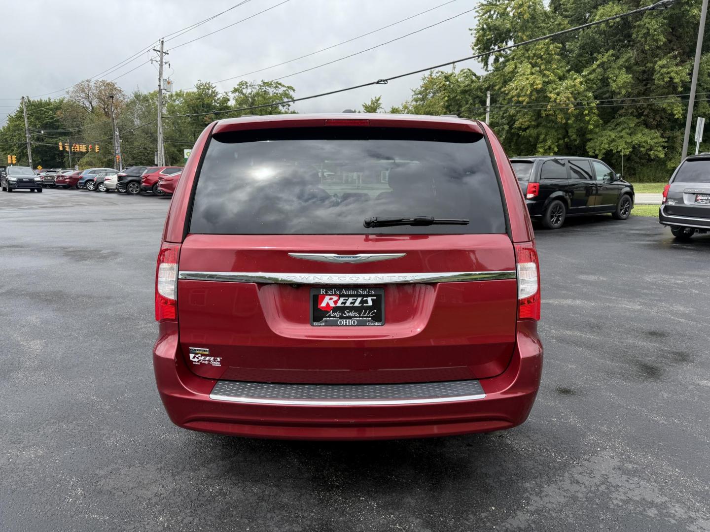 2015 Red /Tan Chrysler Town & Country Touring (2C4RC1BG5FR) with an 3.6L V6 DOHC 24V engine, 6-Speed Automatic transmission, located at 547 E. Main St., Orwell, OH, 44076, (440) 437-5893, 41.535435, -80.847855 - This 2015 Chrysler Town & Country Touring came from Maryland and it shows underneath, equipped with a 3.6L Pentastar V6 engine and 6-speed automatic transmission, offers a luxurious and versatile minivan experience with features like leather interior, tri-zone automatic climate control, power driver - Photo#8
