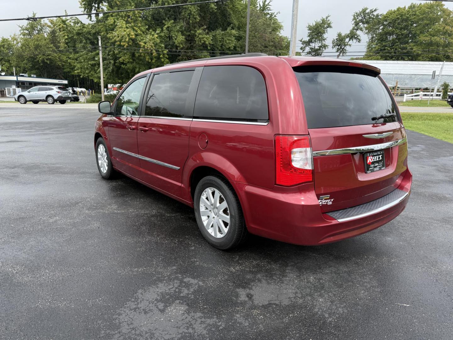 2015 Red /Tan Chrysler Town & Country Touring (2C4RC1BG5FR) with an 3.6L V6 DOHC 24V engine, 6-Speed Automatic transmission, located at 547 E. Main St., Orwell, OH, 44076, (440) 437-5893, 41.535435, -80.847855 - This 2015 Chrysler Town & Country Touring came from Maryland and it shows underneath, equipped with a 3.6L Pentastar V6 engine and 6-speed automatic transmission, offers a luxurious and versatile minivan experience with features like leather interior, tri-zone automatic climate control, power driver - Photo#9