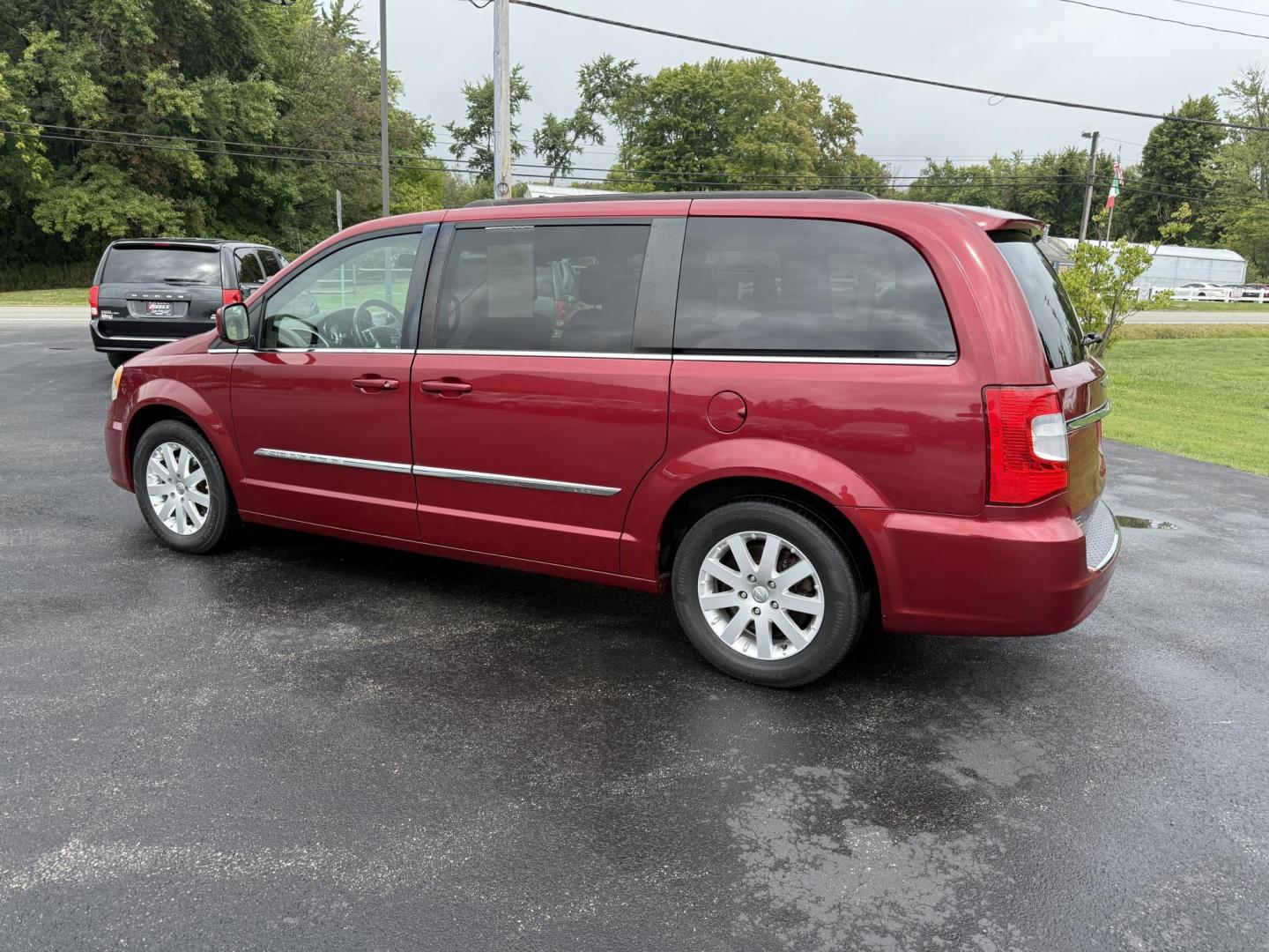 2015 Red /Tan Chrysler Town & Country Touring (2C4RC1BG5FR) with an 3.6L V6 DOHC 24V engine, 6-Speed Automatic transmission, located at 547 E. Main St., Orwell, OH, 44076, (440) 437-5893, 41.535435, -80.847855 - This 2015 Chrysler Town & Country Touring came from Maryland and it shows underneath, equipped with a 3.6L Pentastar V6 engine and 6-speed automatic transmission, offers a luxurious and versatile minivan experience with features like leather interior, tri-zone automatic climate control, power driver - Photo#10