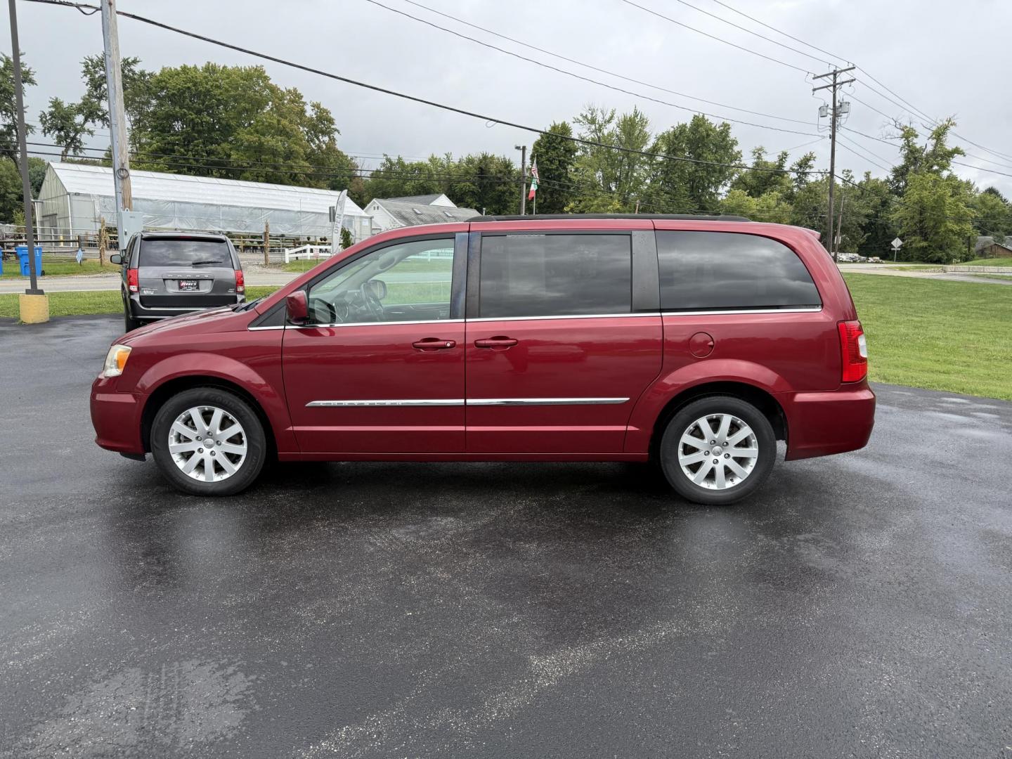 2015 Red /Tan Chrysler Town & Country Touring (2C4RC1BG5FR) with an 3.6L V6 DOHC 24V engine, 6-Speed Automatic transmission, located at 547 E. Main St., Orwell, OH, 44076, (440) 437-5893, 41.535435, -80.847855 - This 2015 Chrysler Town & Country Touring came from Maryland and it shows underneath, equipped with a 3.6L Pentastar V6 engine and 6-speed automatic transmission, offers a luxurious and versatile minivan experience with features like leather interior, tri-zone automatic climate control, power driver - Photo#12