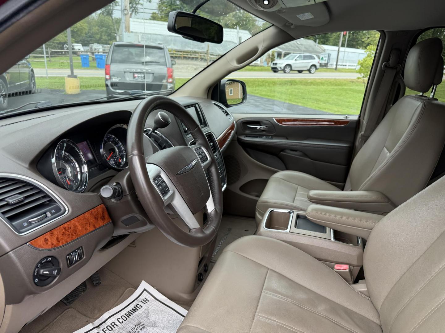 2015 Red /Tan Chrysler Town & Country Touring (2C4RC1BG5FR) with an 3.6L V6 DOHC 24V engine, 6-Speed Automatic transmission, located at 547 E. Main St., Orwell, OH, 44076, (440) 437-5893, 41.535435, -80.847855 - This 2015 Chrysler Town & Country Touring came from Maryland and it shows underneath, equipped with a 3.6L Pentastar V6 engine and 6-speed automatic transmission, offers a luxurious and versatile minivan experience with features like leather interior, tri-zone automatic climate control, power driver - Photo#18