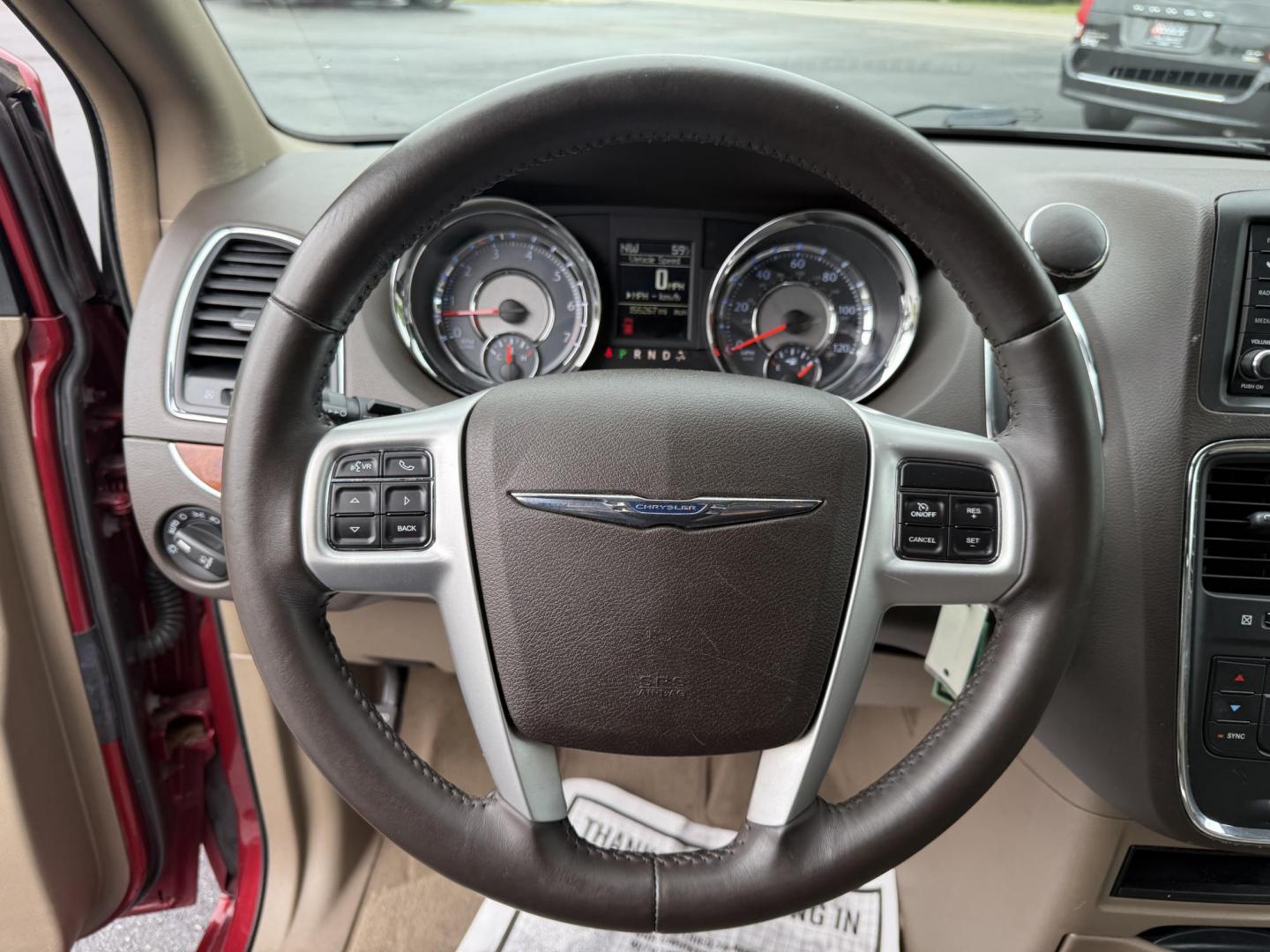 2015 Red /Tan Chrysler Town & Country Touring (2C4RC1BG5FR) with an 3.6L V6 DOHC 24V engine, 6-Speed Automatic transmission, located at 547 E. Main St., Orwell, OH, 44076, (440) 437-5893, 41.535435, -80.847855 - This 2015 Chrysler Town & Country Touring came from Maryland and it shows underneath, equipped with a 3.6L Pentastar V6 engine and 6-speed automatic transmission, offers a luxurious and versatile minivan experience with features like leather interior, tri-zone automatic climate control, power driver - Photo#26