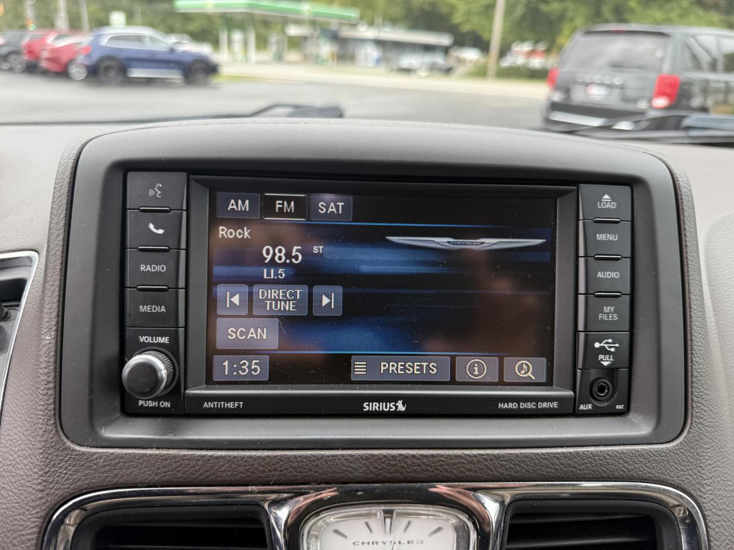 2015 Red /Tan Chrysler Town & Country Touring (2C4RC1BG5FR) with an 3.6L V6 DOHC 24V engine, 6-Speed Automatic transmission, located at 547 E. Main St., Orwell, OH, 44076, (440) 437-5893, 41.535435, -80.847855 - This 2015 Chrysler Town & Country Touring came from Maryland and it shows underneath, equipped with a 3.6L Pentastar V6 engine and 6-speed automatic transmission, offers a luxurious and versatile minivan experience with features like leather interior, tri-zone automatic climate control, power driver - Photo#27