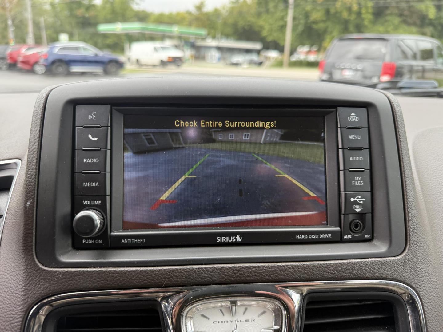 2015 Red /Tan Chrysler Town & Country Touring (2C4RC1BG5FR) with an 3.6L V6 DOHC 24V engine, 6-Speed Automatic transmission, located at 547 E. Main St., Orwell, OH, 44076, (440) 437-5893, 41.535435, -80.847855 - This 2015 Chrysler Town & Country Touring came from Maryland and it shows underneath, equipped with a 3.6L Pentastar V6 engine and 6-speed automatic transmission, offers a luxurious and versatile minivan experience with features like leather interior, tri-zone automatic climate control, power driver - Photo#28