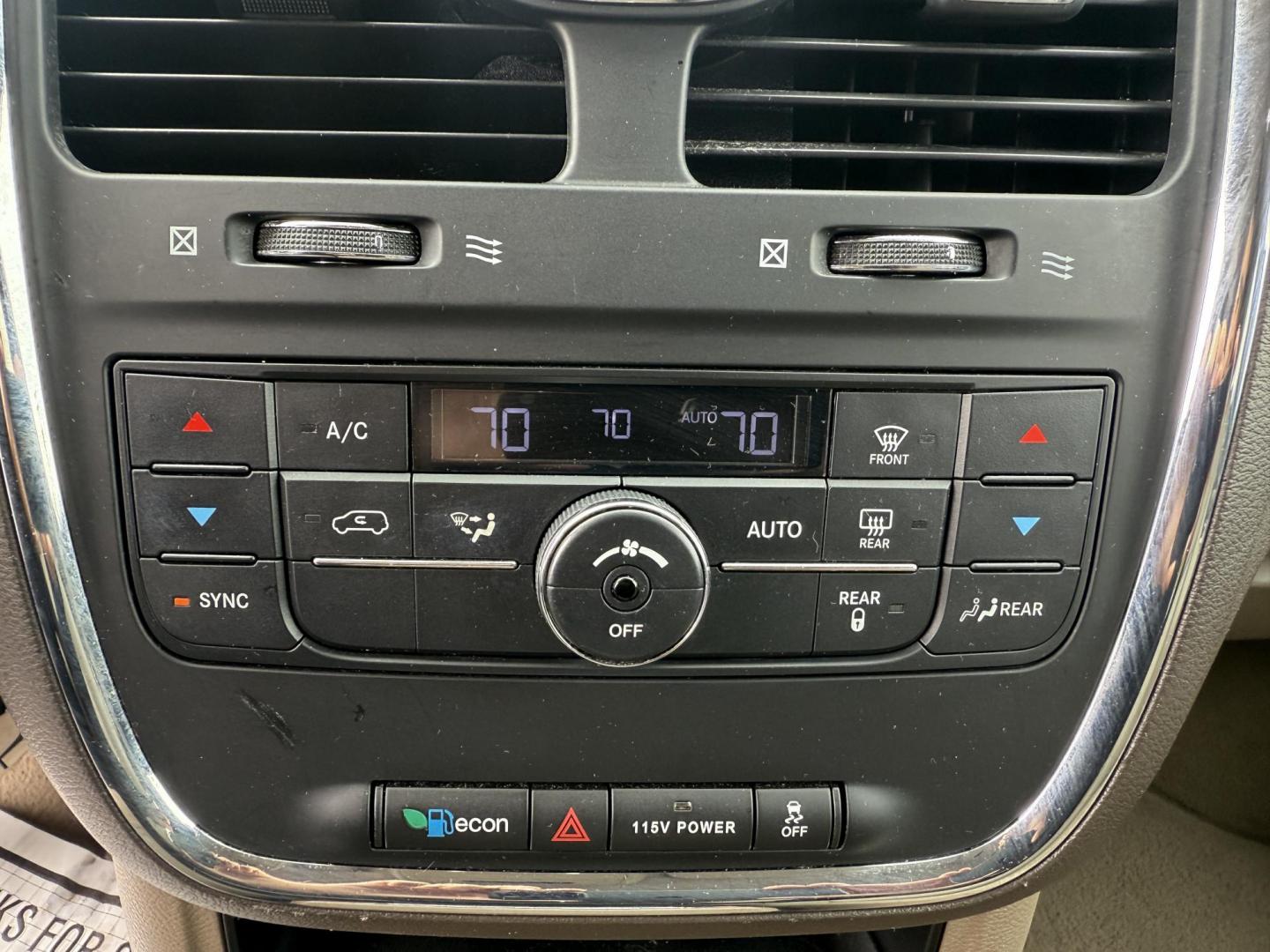 2015 Red /Tan Chrysler Town & Country Touring (2C4RC1BG5FR) with an 3.6L V6 DOHC 24V engine, 6-Speed Automatic transmission, located at 547 E. Main St., Orwell, OH, 44076, (440) 437-5893, 41.535435, -80.847855 - This 2015 Chrysler Town & Country Touring came from Maryland and it shows underneath, equipped with a 3.6L Pentastar V6 engine and 6-speed automatic transmission, offers a luxurious and versatile minivan experience with features like leather interior, tri-zone automatic climate control, power driver - Photo#34