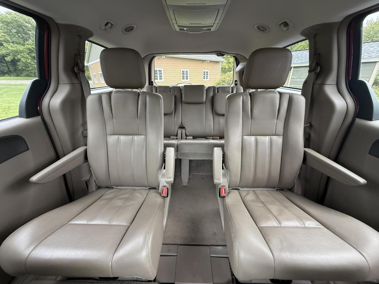 2015 Red /Tan Chrysler Town & Country Touring (2C4RC1BG5FR) with an 3.6L V6 DOHC 24V engine, 6-Speed Automatic transmission, located at 547 E. Main St., Orwell, OH, 44076, (440) 437-5893, 41.535435, -80.847855 - This 2015 Chrysler Town & Country Touring came from Maryland and it shows underneath, equipped with a 3.6L Pentastar V6 engine and 6-speed automatic transmission, offers a luxurious and versatile minivan experience with features like leather interior, tri-zone automatic climate control, power driver - Photo#35