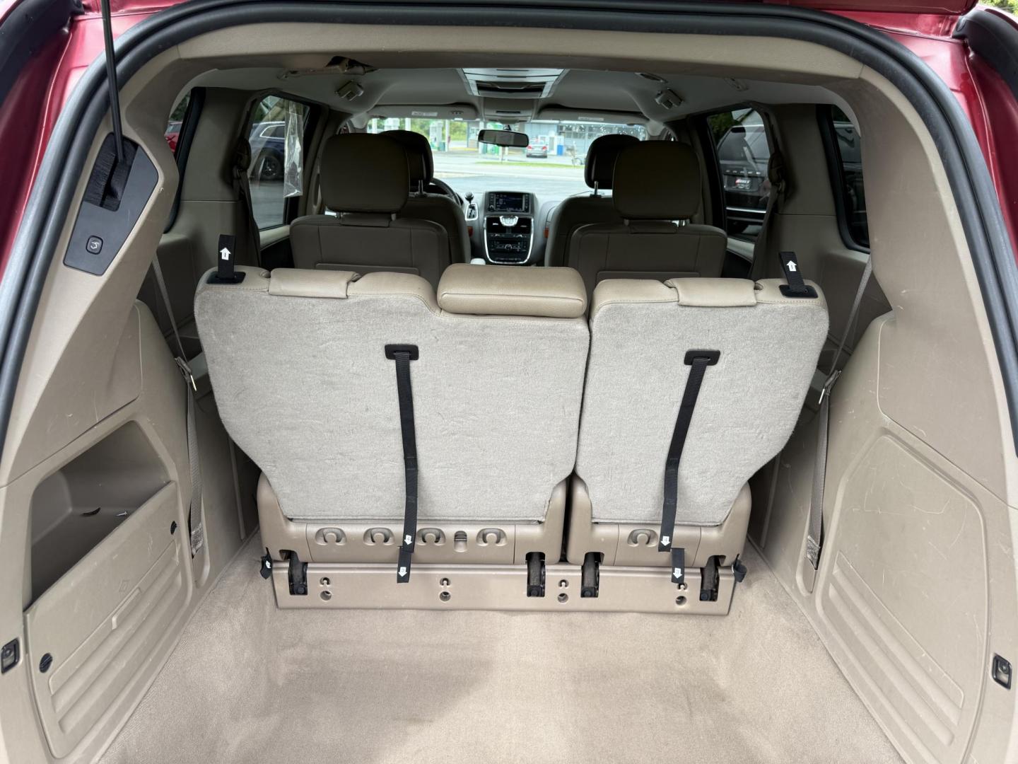 2015 Red /Tan Chrysler Town & Country Touring (2C4RC1BG5FR) with an 3.6L V6 DOHC 24V engine, 6-Speed Automatic transmission, located at 547 E. Main St., Orwell, OH, 44076, (440) 437-5893, 41.535435, -80.847855 - This 2015 Chrysler Town & Country Touring came from Maryland and it shows underneath, equipped with a 3.6L Pentastar V6 engine and 6-speed automatic transmission, offers a luxurious and versatile minivan experience with features like leather interior, tri-zone automatic climate control, power driver - Photo#41