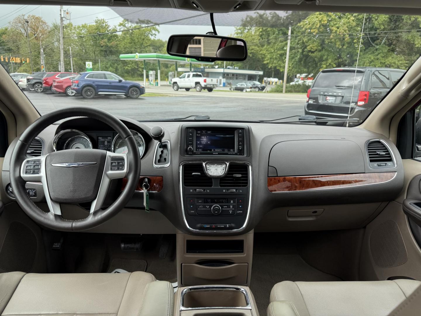 2015 Red /Tan Chrysler Town & Country Touring (2C4RC1BG5FR) with an 3.6L V6 DOHC 24V engine, 6-Speed Automatic transmission, located at 547 E. Main St., Orwell, OH, 44076, (440) 437-5893, 41.535435, -80.847855 - This 2015 Chrysler Town & Country Touring came from Maryland and it shows underneath, equipped with a 3.6L Pentastar V6 engine and 6-speed automatic transmission, offers a luxurious and versatile minivan experience with features like leather interior, tri-zone automatic climate control, power driver - Photo#40