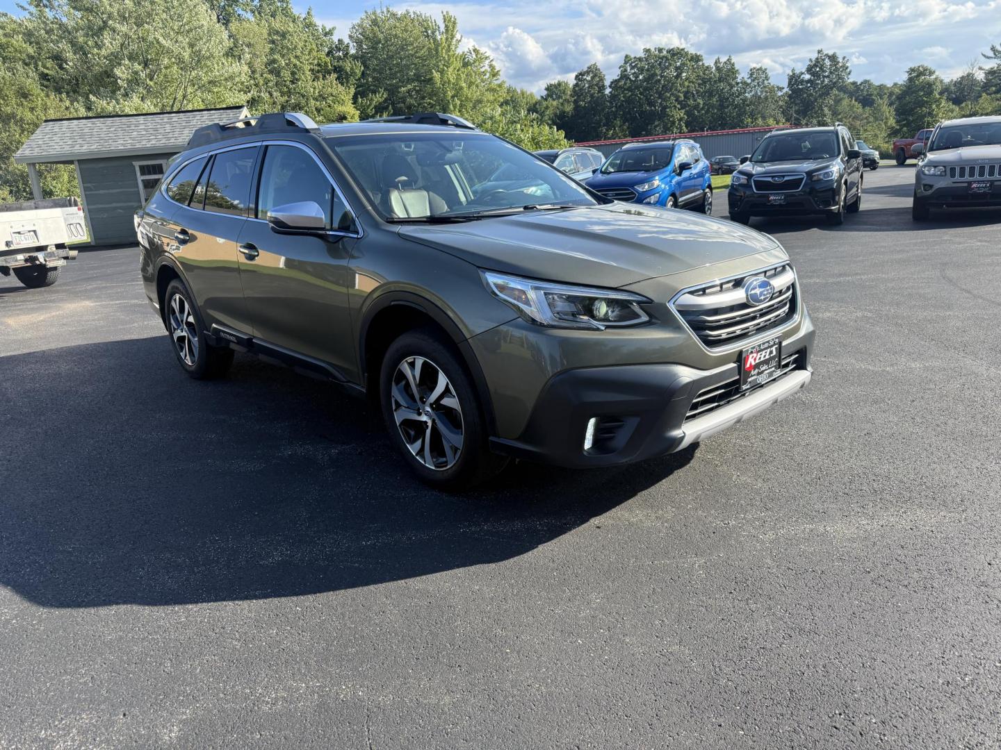 2020 Green /Brown Subaru Outback Touring (4S4BTAPC4L3) with an 2.5L H4 DOHC 16V engine, Automatic transmission, located at 11115 Chardon Rd. , Chardon, OH, 44024, (440) 214-9705, 41.580246, -81.241943 - This One Owner 2020 Subaru Outback Touring with a 2.5L H4 engine and Symmetrical AWD delivers excellent versatility and efficiency, reaching up to 33 MPG highway. It boasts a luxurious leather interior, heated and cooled power front seats, dual-zone automatic climate control, a large 11.6-inch touch - Photo#2