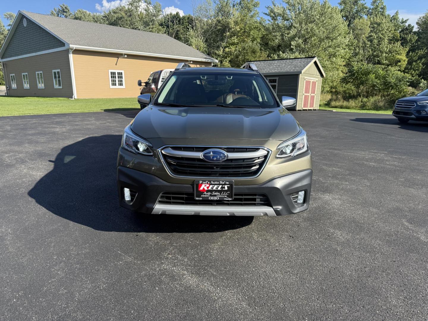 2020 Green /Brown Subaru Outback Touring (4S4BTAPC4L3) with an 2.5L H4 DOHC 16V engine, Automatic transmission, located at 11115 Chardon Rd. , Chardon, OH, 44024, (440) 214-9705, 41.580246, -81.241943 - This One Owner 2020 Subaru Outback Touring with a 2.5L H4 engine and Symmetrical AWD delivers excellent versatility and efficiency, reaching up to 33 MPG highway. It boasts a luxurious leather interior, heated and cooled power front seats, dual-zone automatic climate control, a large 11.6-inch touch - Photo#1