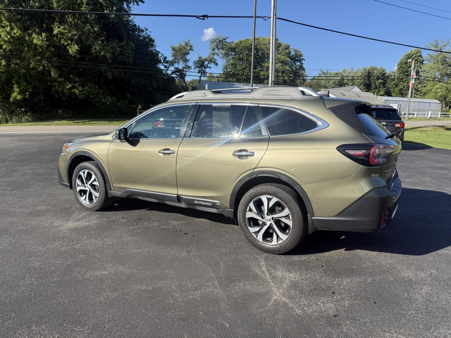 2020 Green /Brown Subaru Outback Touring (4S4BTAPC4L3) with an 2.5L H4 DOHC 16V engine, Automatic transmission, located at 11115 Chardon Rd. , Chardon, OH, 44024, (440) 214-9705, 41.580246, -81.241943 - This One Owner 2020 Subaru Outback Touring with a 2.5L H4 engine and Symmetrical AWD delivers excellent versatility and efficiency, reaching up to 33 MPG highway. It boasts a luxurious leather interior, heated and cooled power front seats, dual-zone automatic climate control, a large 11.6-inch touch - Photo#11