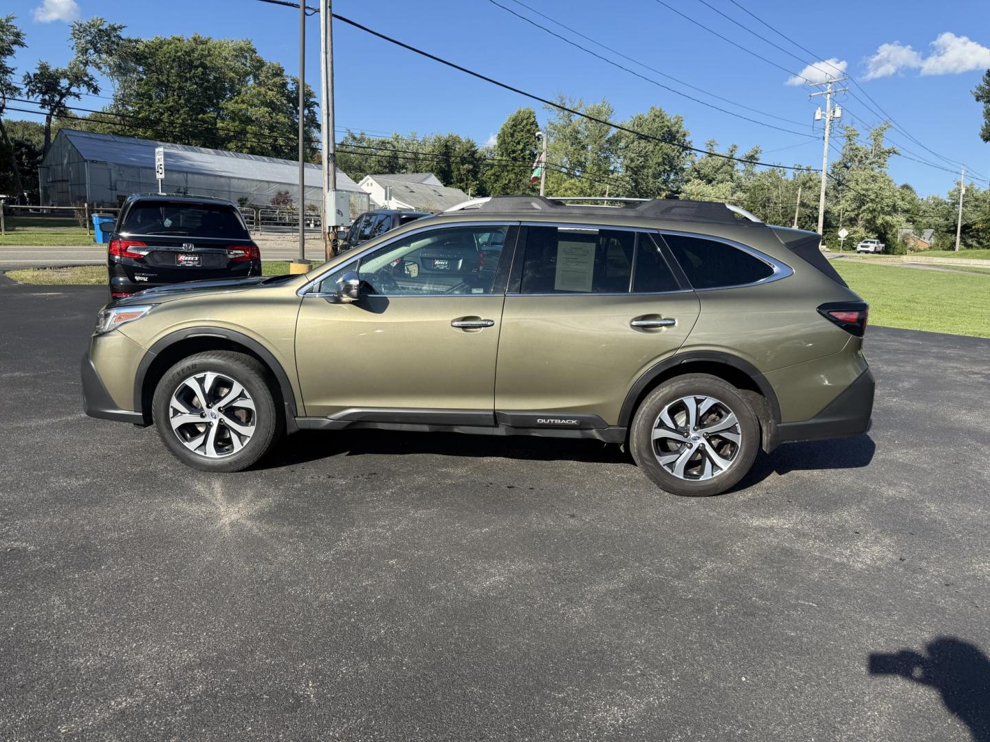 2020 Green /Brown Subaru Outback Touring (4S4BTAPC4L3) with an 2.5L H4 DOHC 16V engine, Automatic transmission, located at 11115 Chardon Rd. , Chardon, OH, 44024, (440) 214-9705, 41.580246, -81.241943 - This One Owner 2020 Subaru Outback Touring with a 2.5L H4 engine and Symmetrical AWD delivers excellent versatility and efficiency, reaching up to 33 MPG highway. It boasts a luxurious leather interior, heated and cooled power front seats, dual-zone automatic climate control, a large 11.6-inch touch - Photo#13