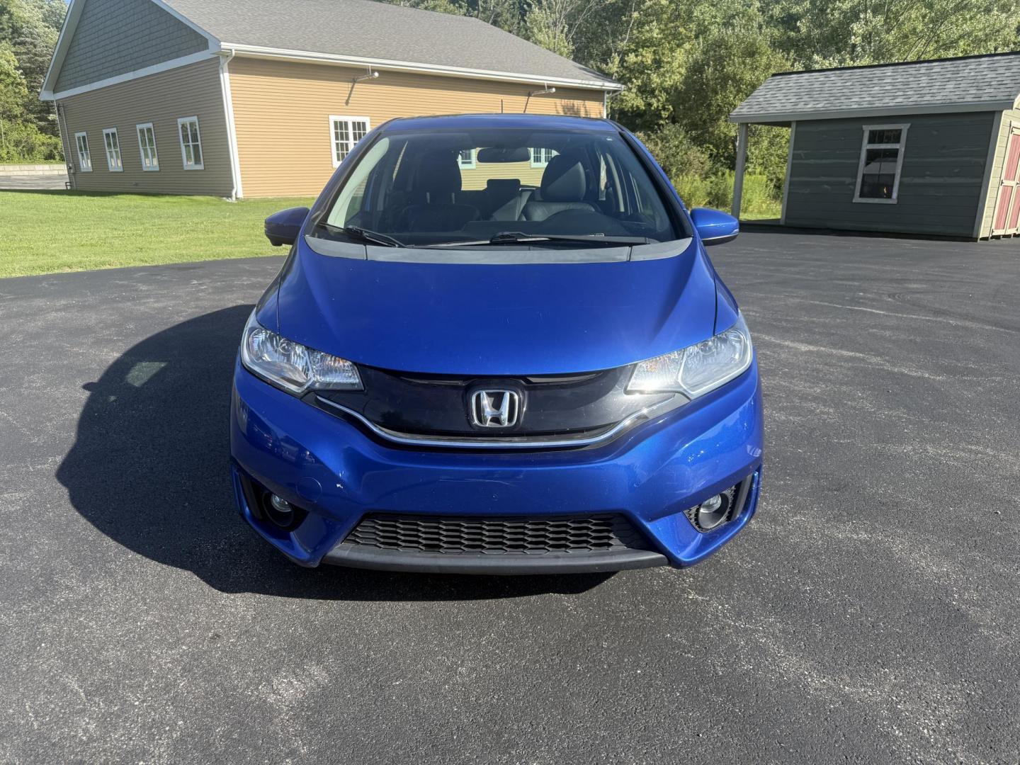 2016 Blue /Black Honda Fit EX-L CVT (3HGGK5H88GM) with an 1.5L I4 SOHC 16V engine, Automatic transmission, located at 11115 Chardon Rd. , Chardon, OH, 44024, (440) 214-9705, 41.580246, -81.241943 - This 2016 Honda Fit EX-L, powered by a 1.5L I4 engine, delivers impressive efficiency with up to 40 MPG highway and packs a surprising array of premium features for its class, including leather interior, heated front seats, a power moonroof, and a 7-inch touchscreen with push-button start. Safety an - Photo#1