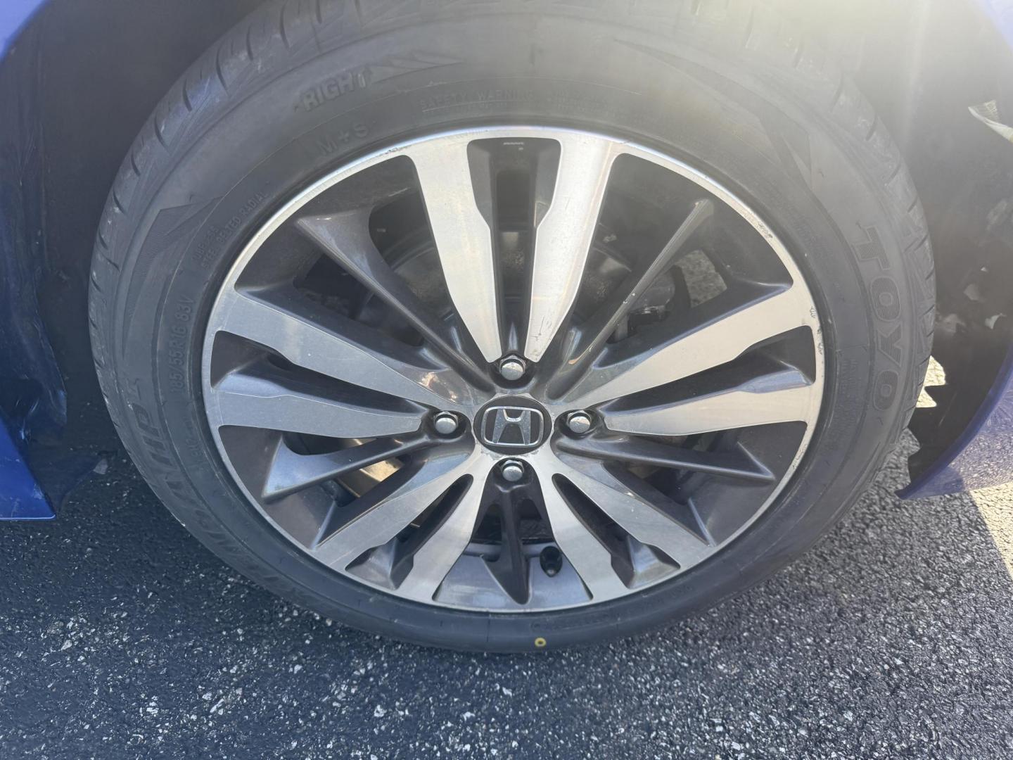 2016 Blue /Black Honda Fit EX-L CVT (3HGGK5H88GM) with an 1.5L I4 SOHC 16V engine, Automatic transmission, located at 11115 Chardon Rd. , Chardon, OH, 44024, (440) 214-9705, 41.580246, -81.241943 - This 2016 Honda Fit EX-L, powered by a 1.5L I4 engine, delivers impressive efficiency with up to 40 MPG highway and packs a surprising array of premium features for its class, including leather interior, heated front seats, a power moonroof, and a 7-inch touchscreen with push-button start. Safety an - Photo#4