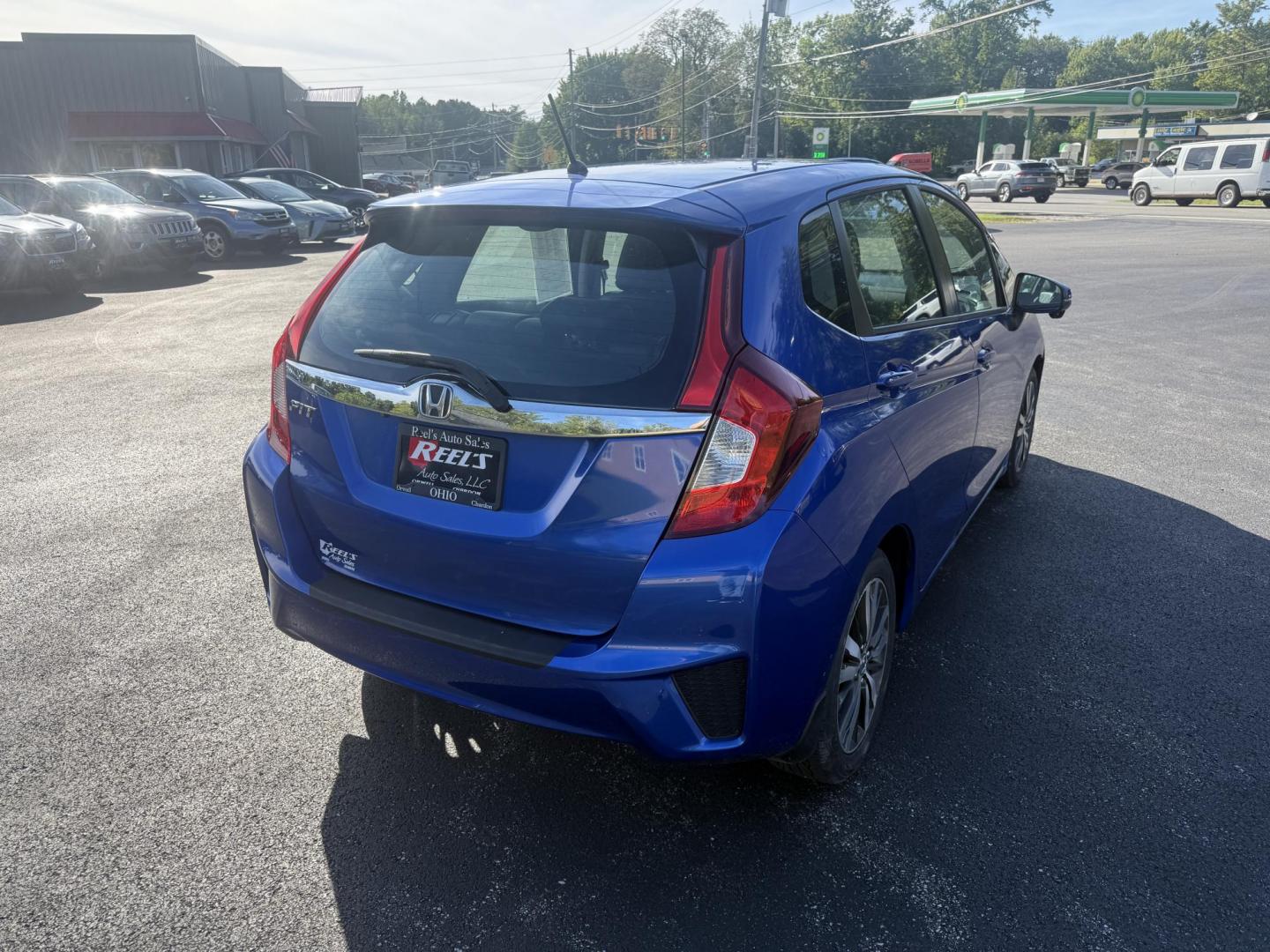 2016 Blue /Black Honda Fit EX-L CVT (3HGGK5H88GM) with an 1.5L I4 SOHC 16V engine, Automatic transmission, located at 11115 Chardon Rd. , Chardon, OH, 44024, (440) 214-9705, 41.580246, -81.241943 - This 2016 Honda Fit EX-L, powered by a 1.5L I4 engine, delivers impressive efficiency with up to 40 MPG highway and packs a surprising array of premium features for its class, including leather interior, heated front seats, a power moonroof, and a 7-inch touchscreen with push-button start. Safety an - Photo#7
