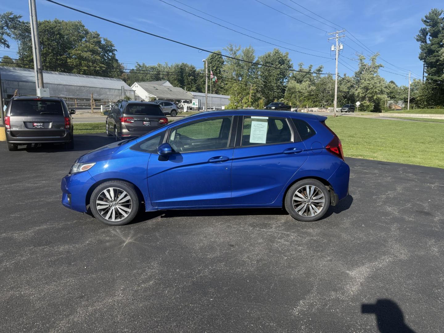 2016 Blue /Black Honda Fit EX-L CVT (3HGGK5H88GM) with an 1.5L I4 SOHC 16V engine, Automatic transmission, located at 11115 Chardon Rd. , Chardon, OH, 44024, (440) 214-9705, 41.580246, -81.241943 - This 2016 Honda Fit EX-L, powered by a 1.5L I4 engine, delivers impressive efficiency with up to 40 MPG highway and packs a surprising array of premium features for its class, including leather interior, heated front seats, a power moonroof, and a 7-inch touchscreen with push-button start. Safety an - Photo#12