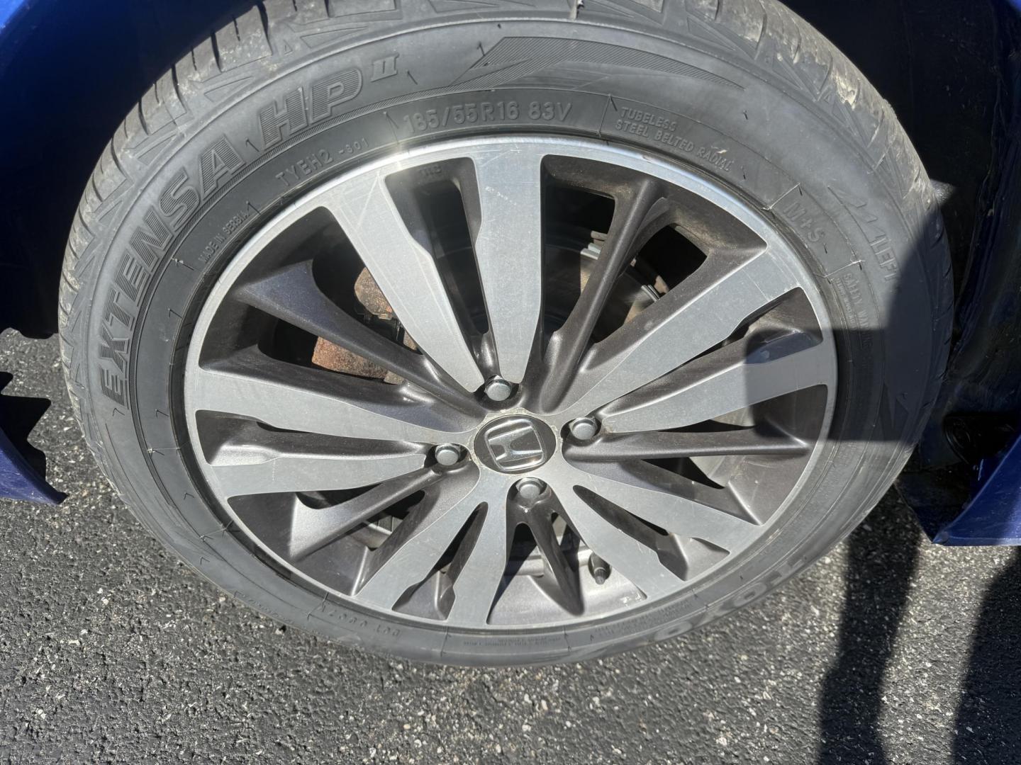 2016 Blue /Black Honda Fit EX-L CVT (3HGGK5H88GM) with an 1.5L I4 SOHC 16V engine, Automatic transmission, located at 11115 Chardon Rd. , Chardon, OH, 44024, (440) 214-9705, 41.580246, -81.241943 - This 2016 Honda Fit EX-L, powered by a 1.5L I4 engine, delivers impressive efficiency with up to 40 MPG highway and packs a surprising array of premium features for its class, including leather interior, heated front seats, a power moonroof, and a 7-inch touchscreen with push-button start. Safety an - Photo#13