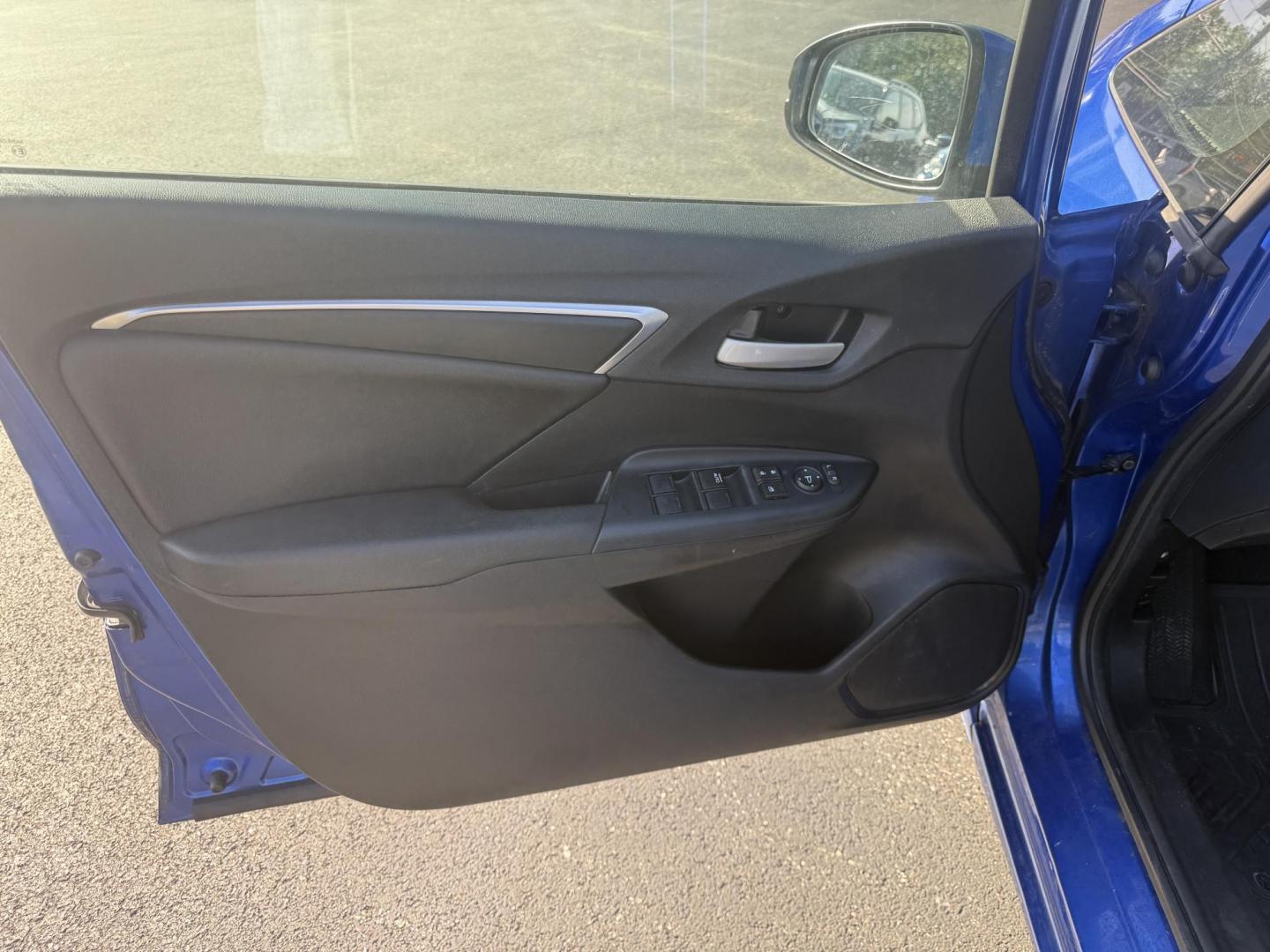 2016 Blue /Black Honda Fit EX-L CVT (3HGGK5H88GM) with an 1.5L I4 SOHC 16V engine, Automatic transmission, located at 11115 Chardon Rd. , Chardon, OH, 44024, (440) 214-9705, 41.580246, -81.241943 - This 2016 Honda Fit EX-L, powered by a 1.5L I4 engine, delivers impressive efficiency with up to 40 MPG highway and packs a surprising array of premium features for its class, including leather interior, heated front seats, a power moonroof, and a 7-inch touchscreen with push-button start. Safety an - Photo#16